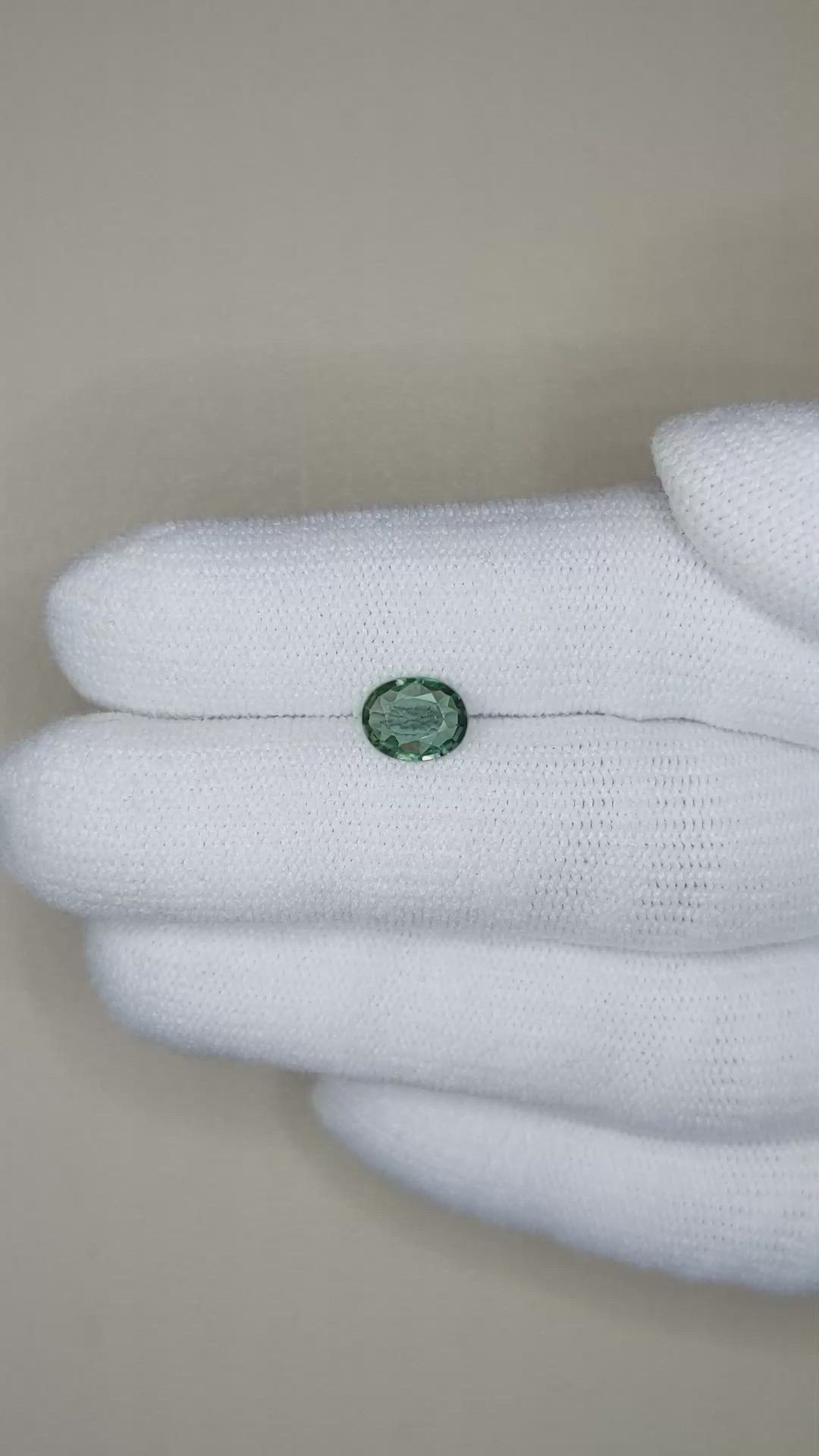 0.97 Ct. Bluish Green Sapphire from Madagascar Size Video