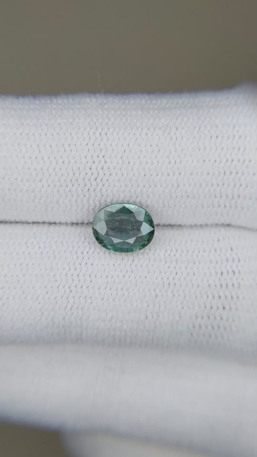 0.97 Ct. Bluish Green Sapphire from Madagascar Size Video
