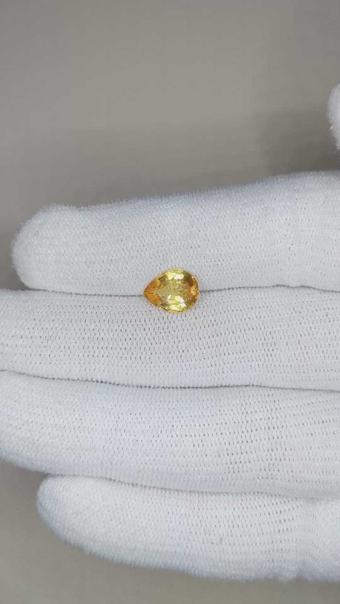 2.02 Ct. Orangish Yellow Sapphire from Madagascar Size Video