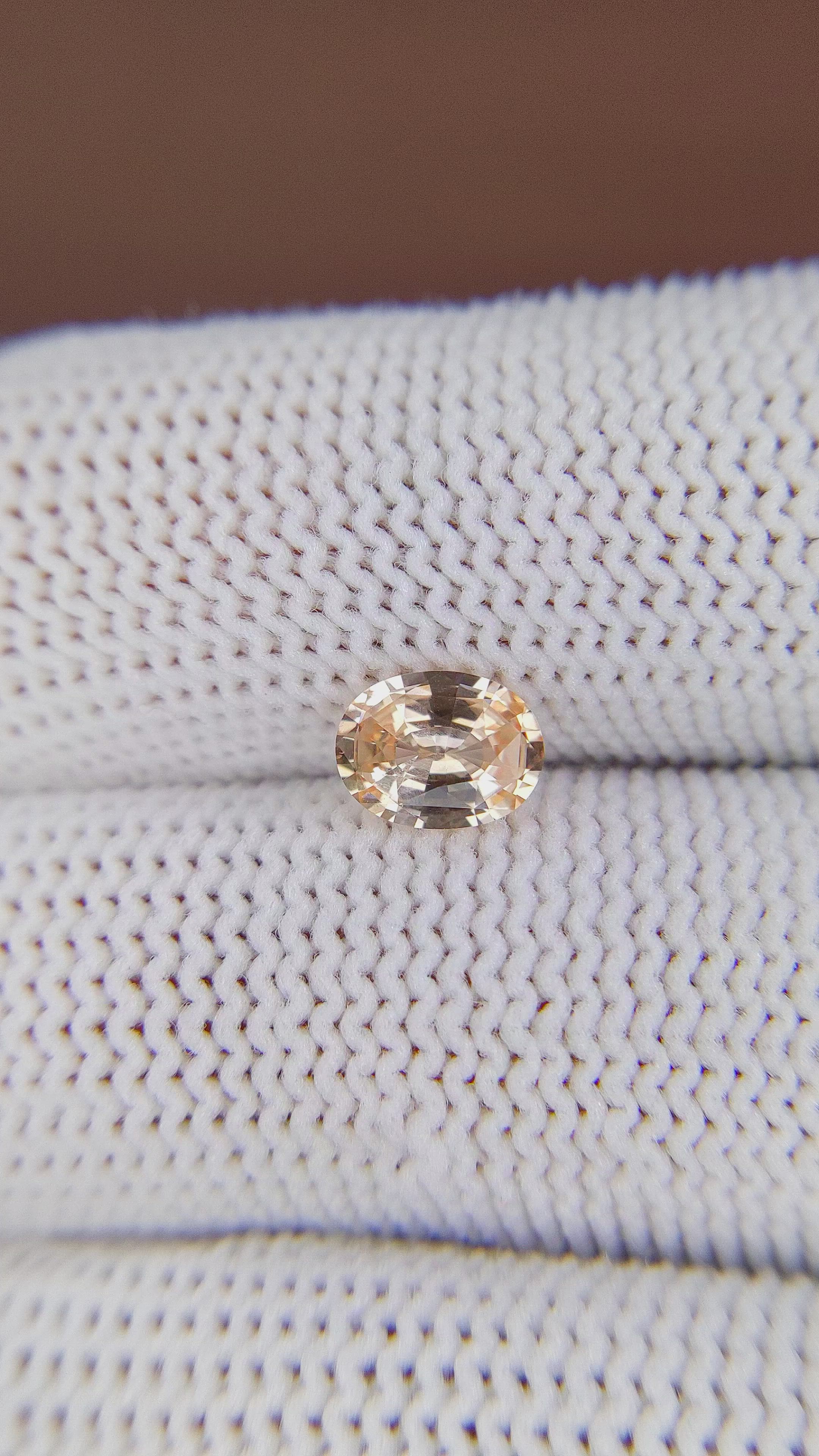 0.99 Ct. Peach Sapphire from Ceylon (Sri Lanka) Size Video