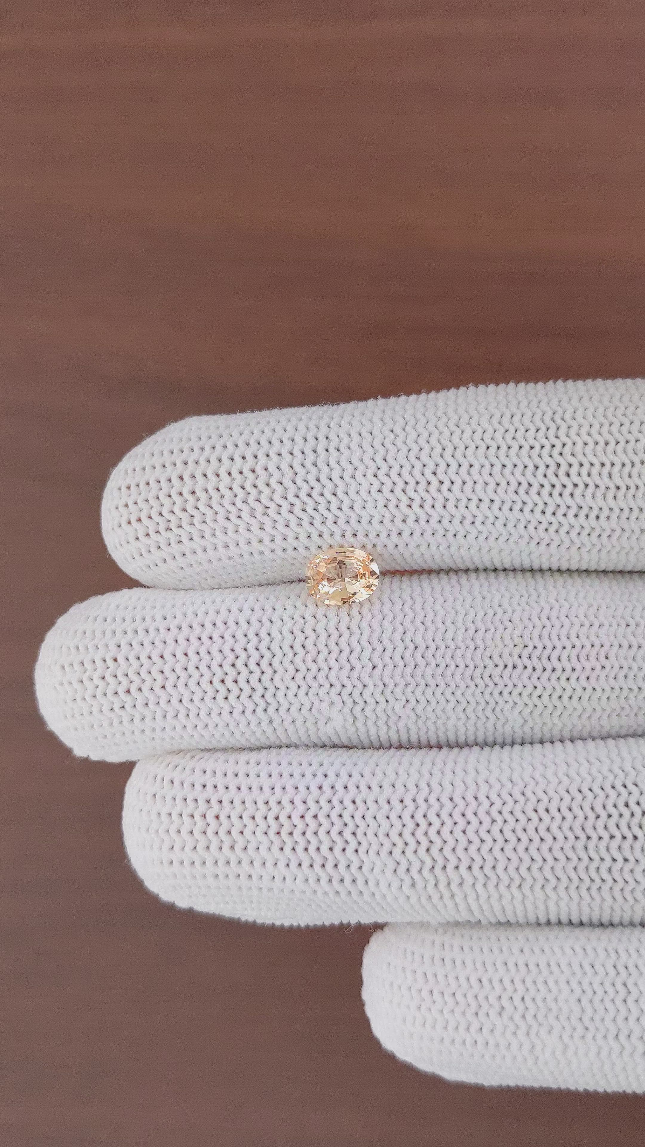 0.99 Ct. Peach Sapphire from Ceylon (Sri Lanka) Size Video