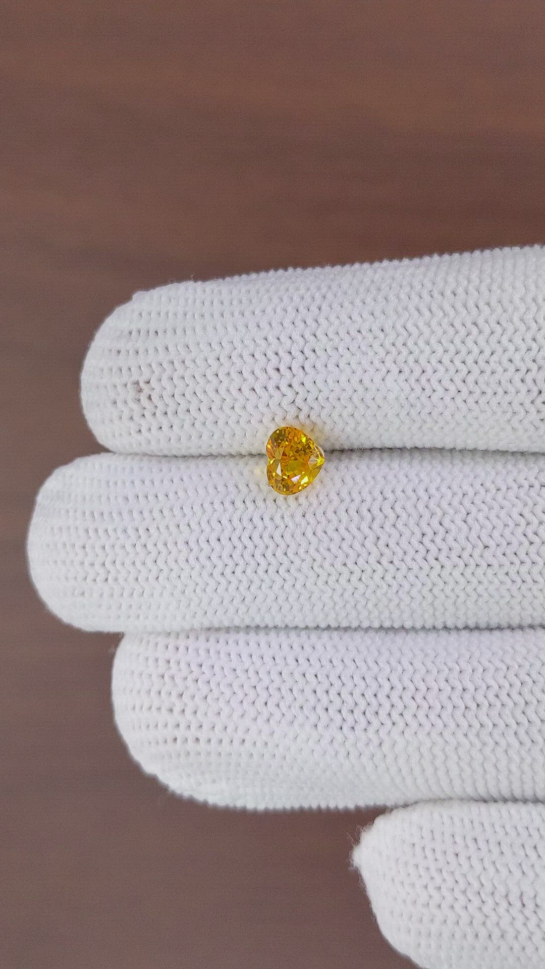 1.20 Ct. Orangish Yellow Sapphire from Ceylon (Sri Lanka) Size Video