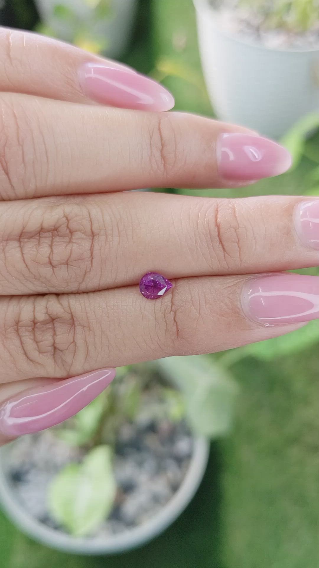 0.59 Ct. Purplish Pink Sapphire from Ceylon (Sri Lanka) Size Video