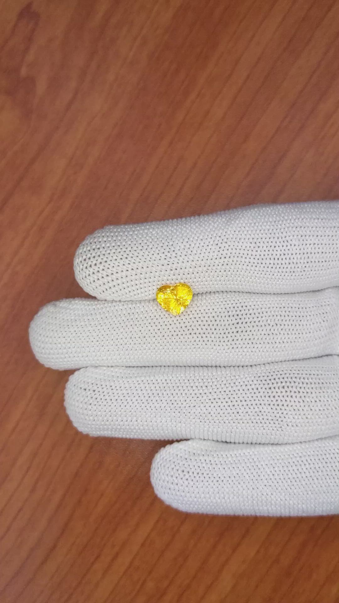 1.60 Ct. Orangish Yellow Sapphire from Ceylon (Sri Lanka) Size Video