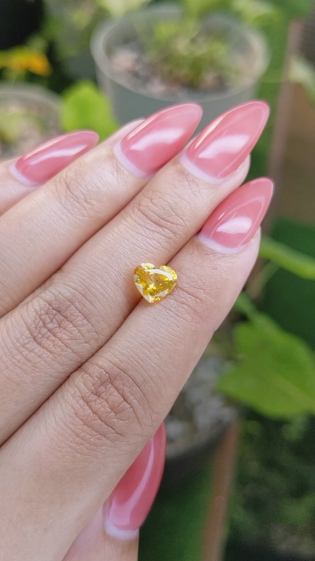 1.60 Ct. Orangish Yellow Sapphire from Ceylon (Sri Lanka) Size Video