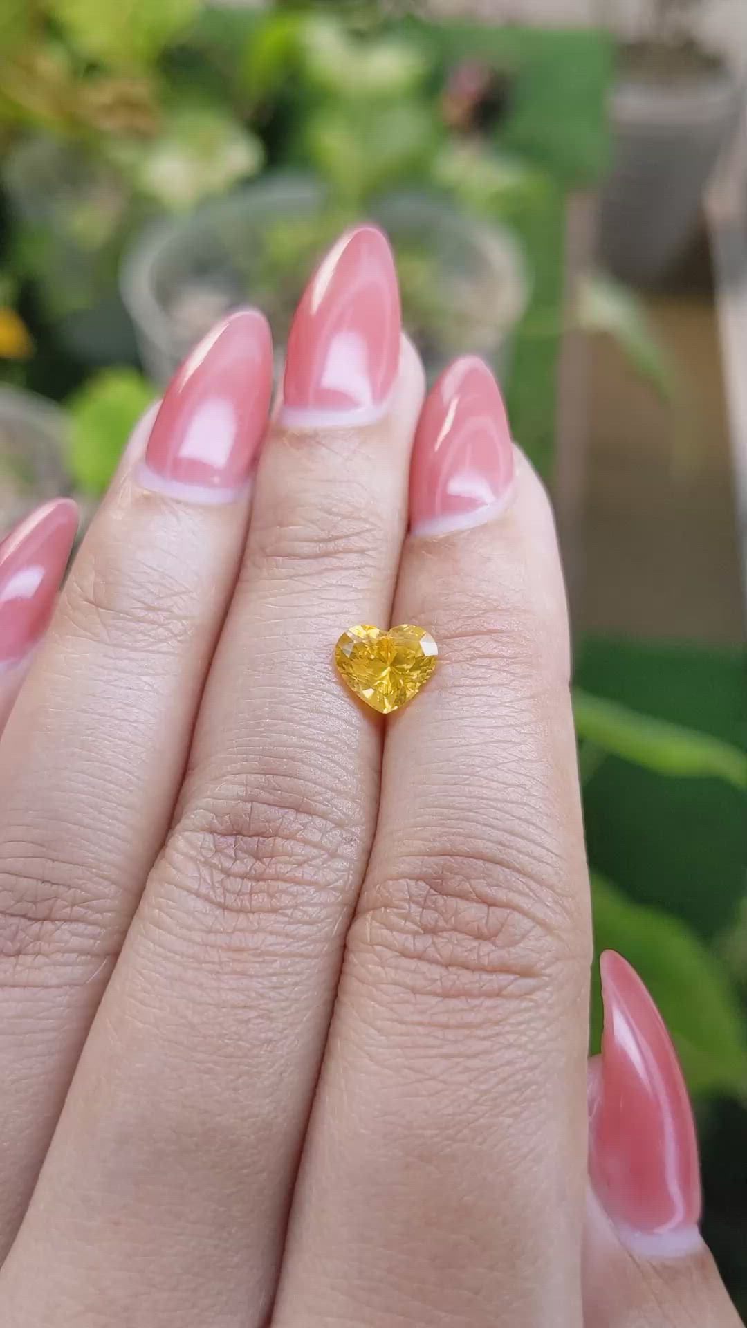 1.60 Ct. Orangish Yellow Sapphire from Ceylon (Sri Lanka) Size Video