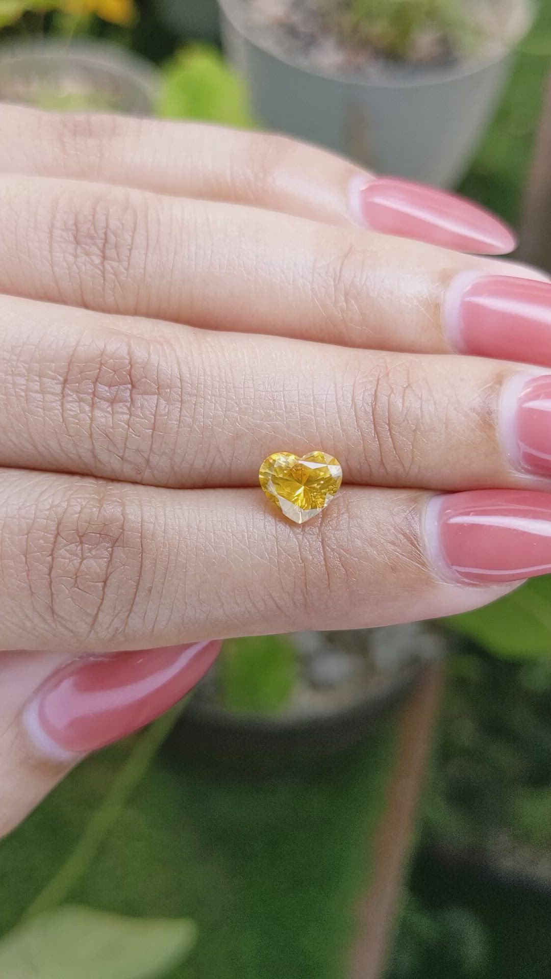 1.60 Ct. Orangish Yellow Sapphire from Ceylon (Sri Lanka) Size Video