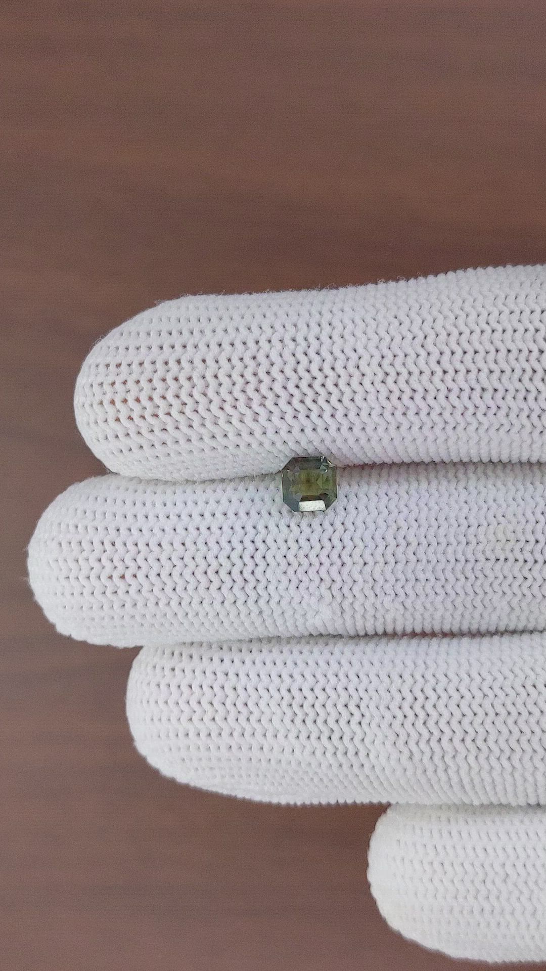 0.93 Ct. Greenish Brown Sapphire from Madagascar Size Video