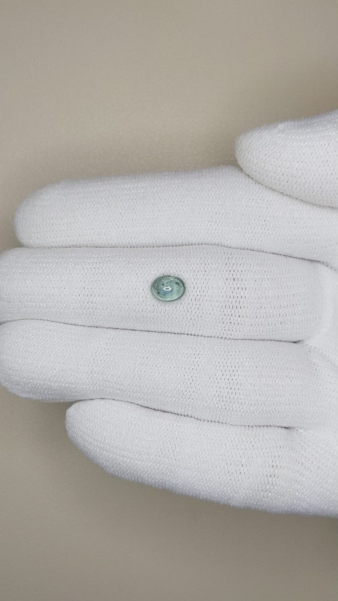 0.80 Ct. Bluish Green Cabochon Sapphire from Montana Size Video