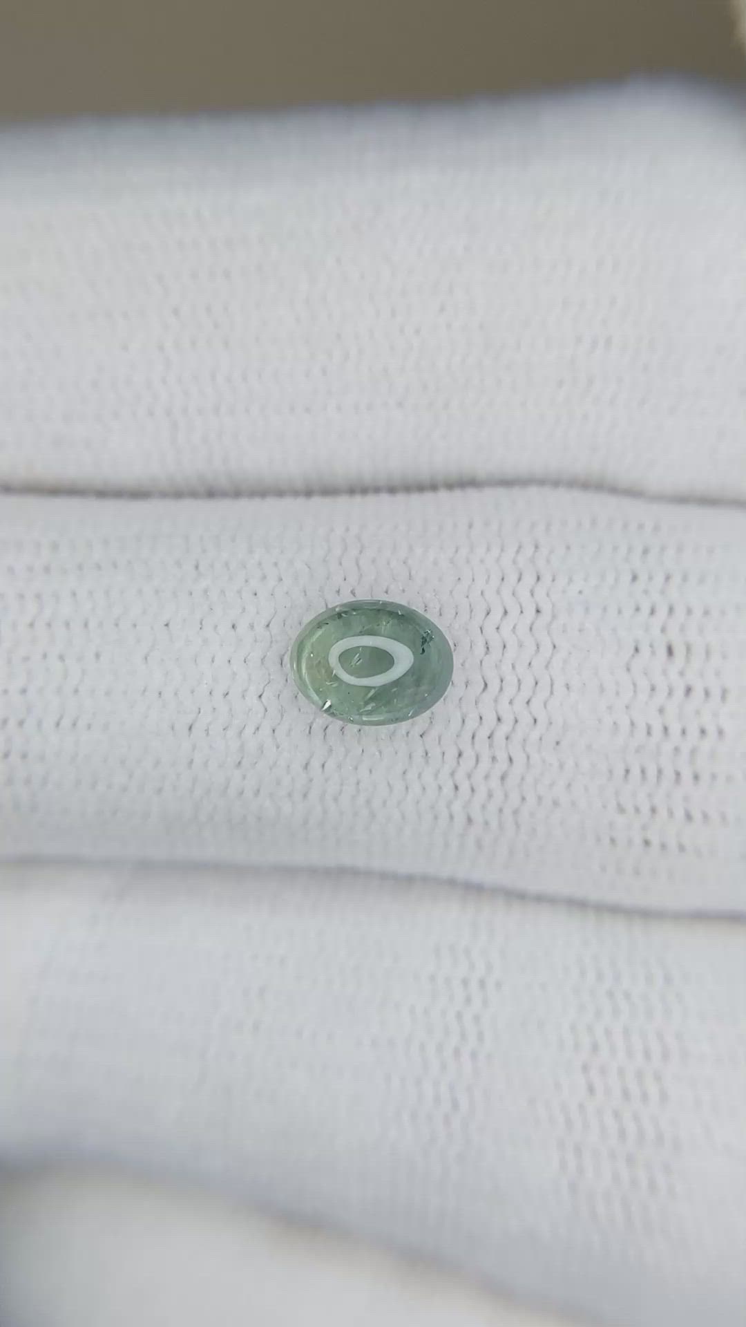0.82 Ct. Bluish Green Cabochon Sapphire from Montana Size Video