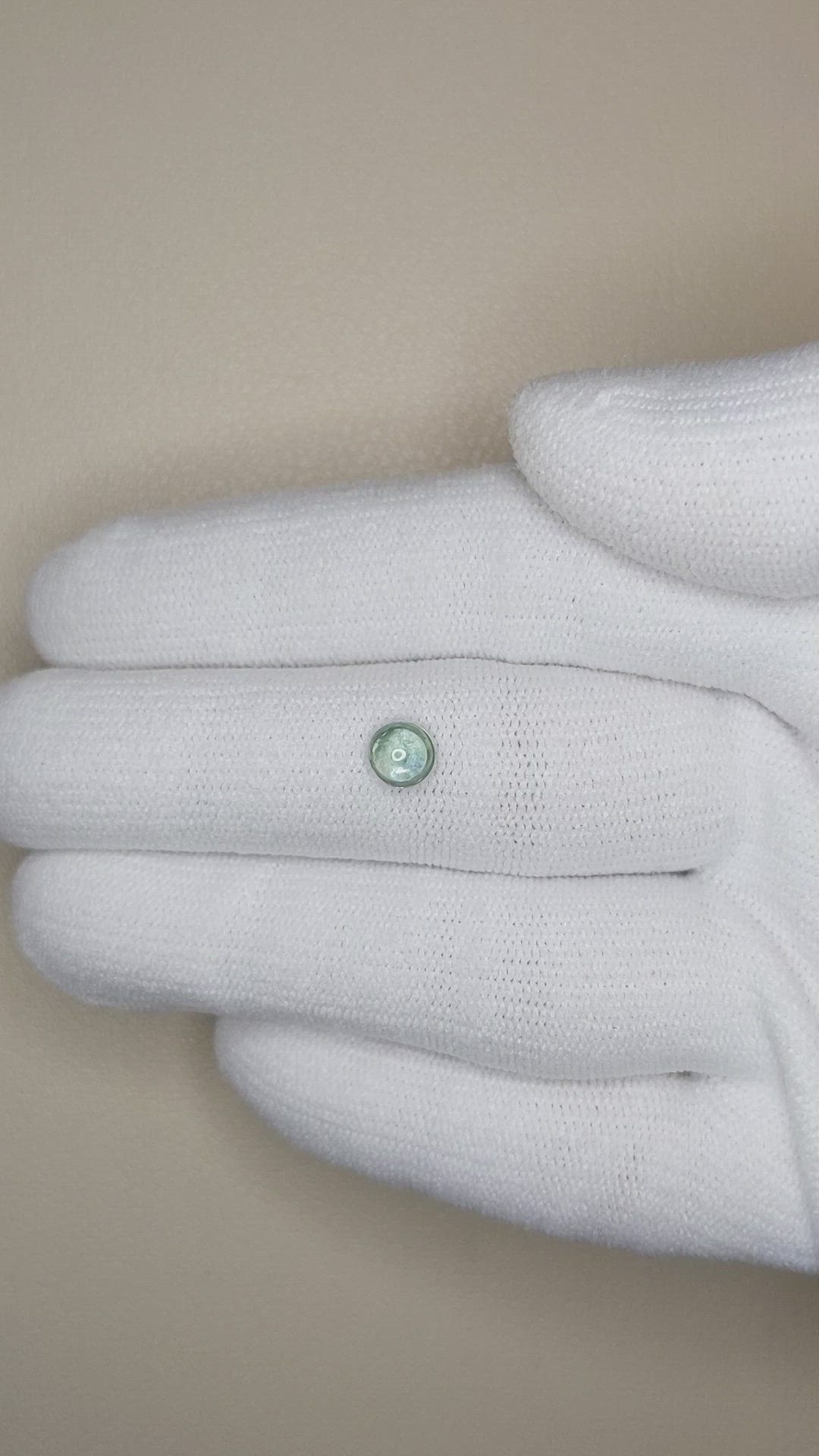 0.73 Ct. Bluish Green Cabochon Sapphire from Montana Size Video