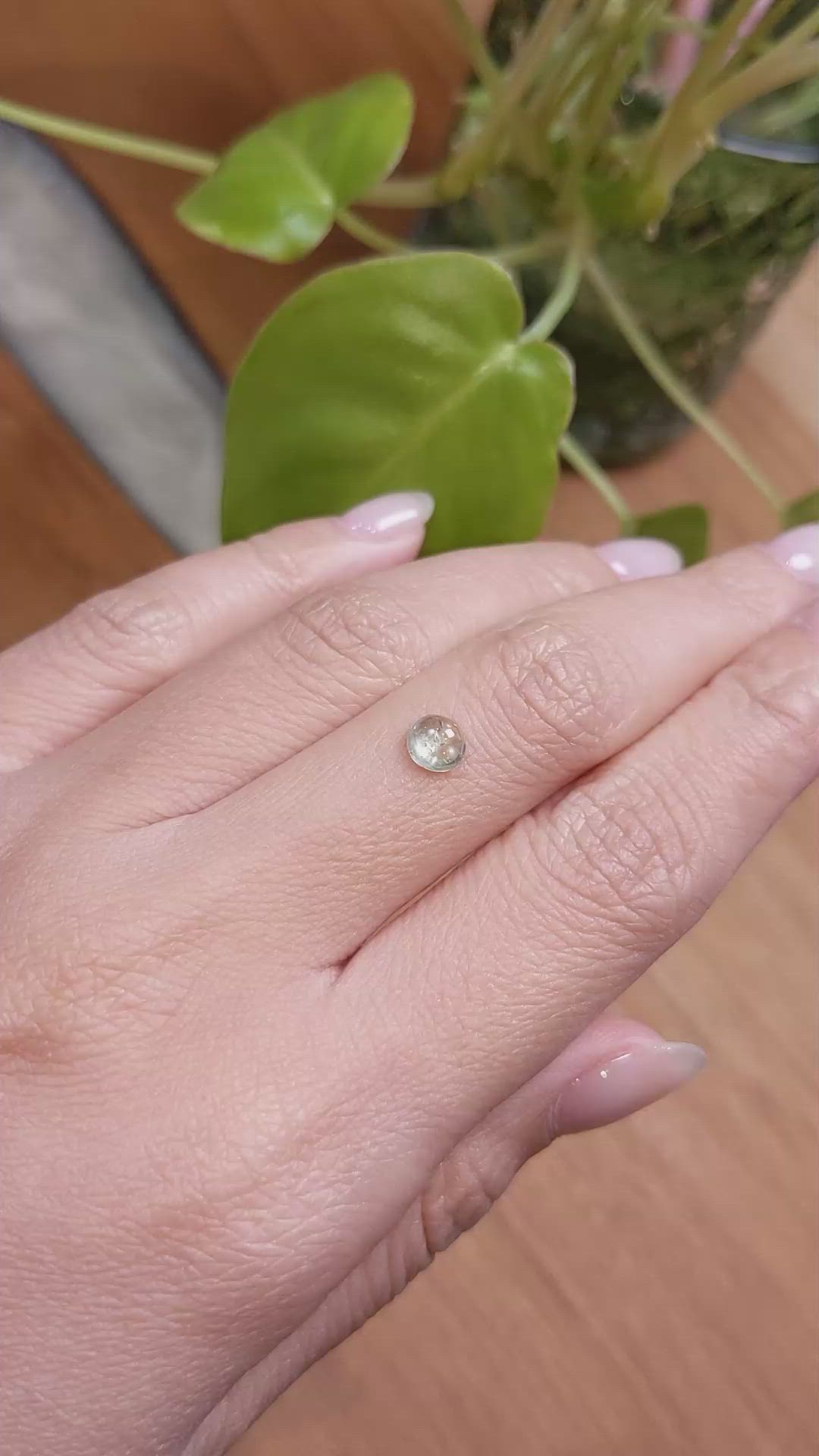 0.74 Ct. Yellowish Green Cabochon Sapphire from Montana Size Video