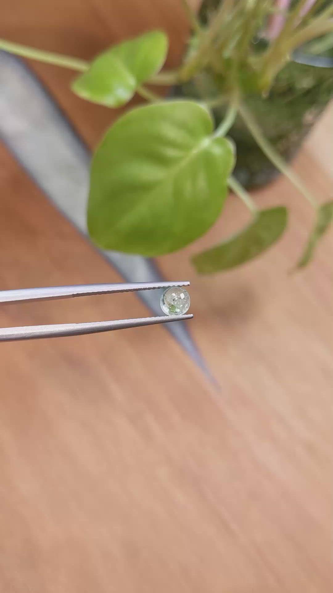 0.74 Ct. Yellowish Green Cabochon Sapphire from Montana Size Video