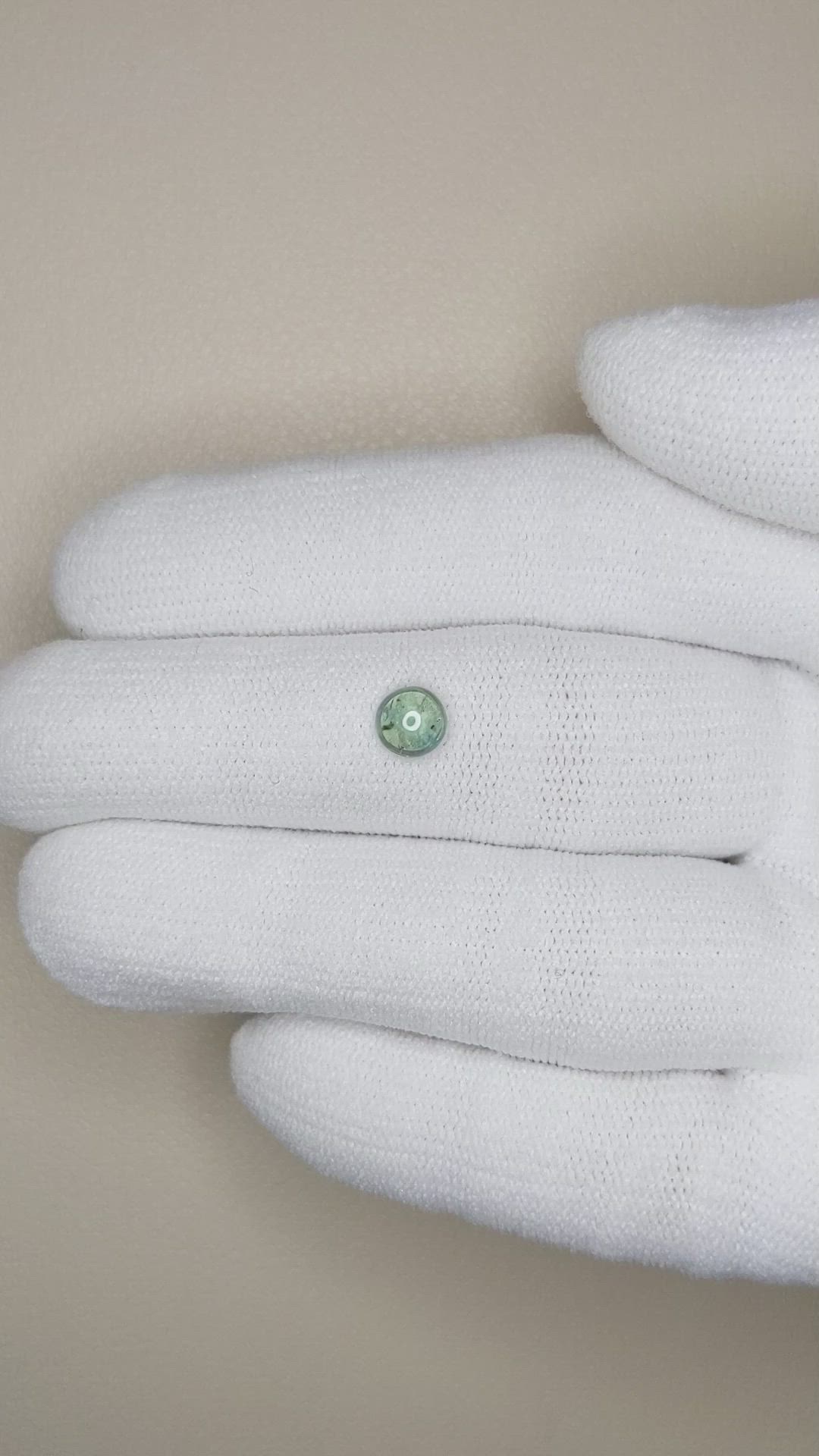 0.76 Ct. Bluish Green Cabochon Sapphire from Montana Size Video
