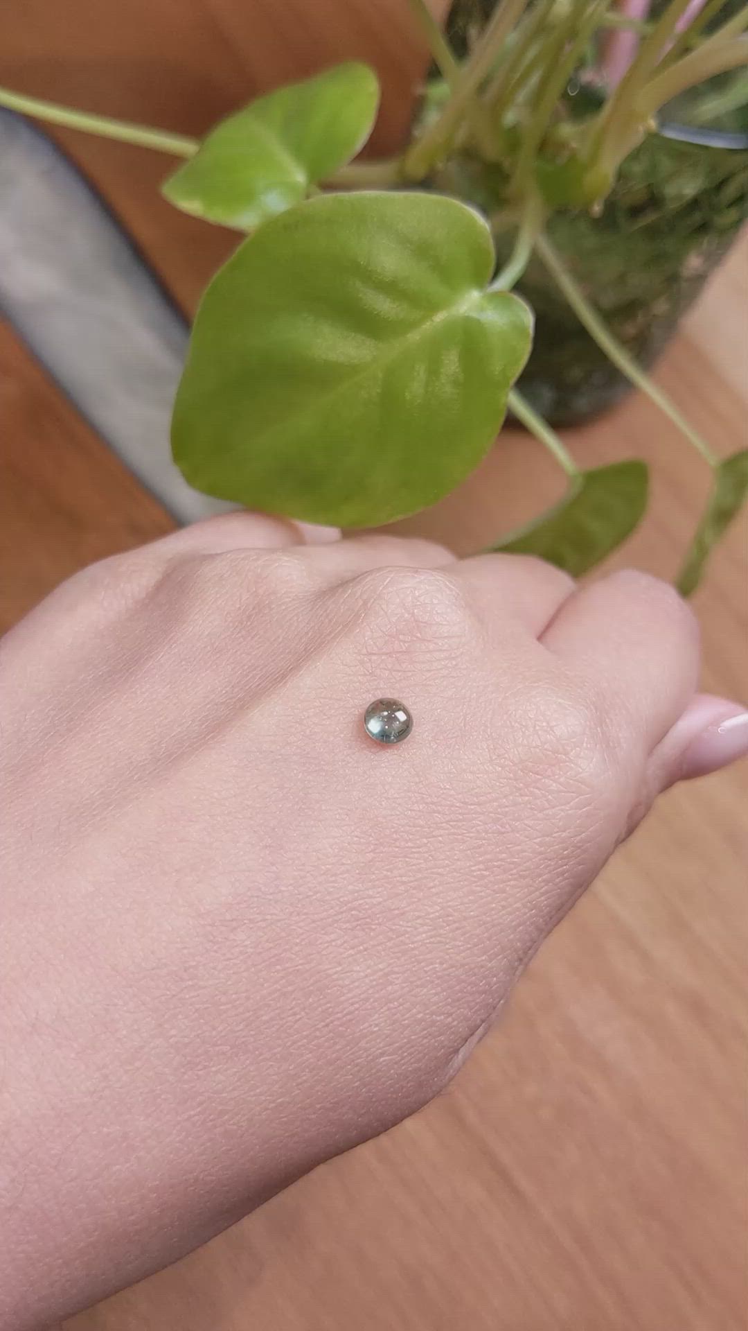 0.76 Ct. Bluish Green Cabochon Sapphire from Montana Size Video