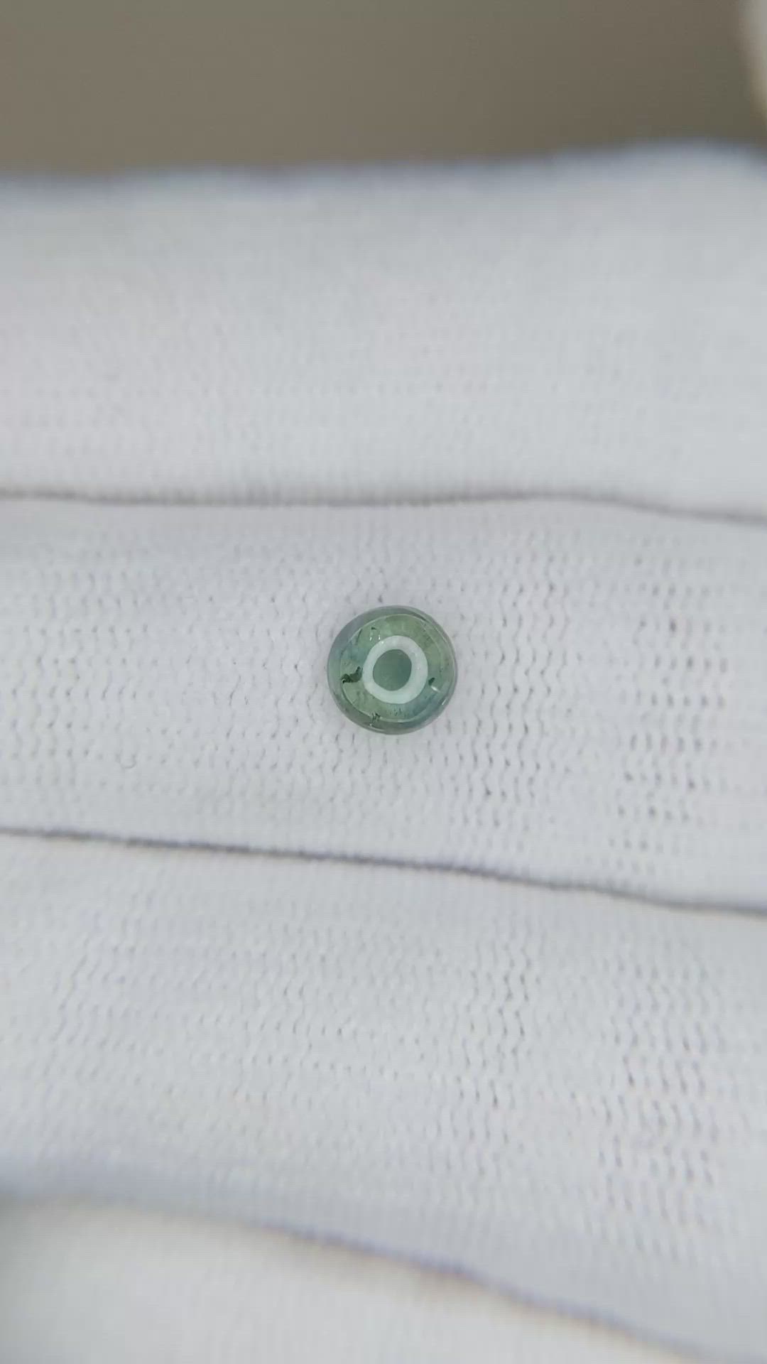 0.76 Ct. Bluish Green Cabochon Sapphire from Montana Size Video