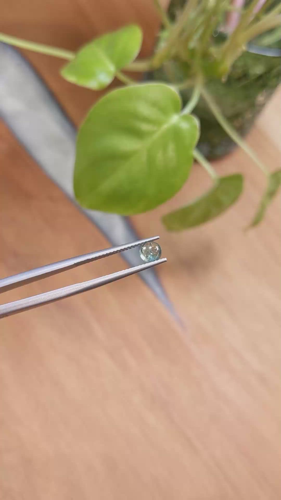 0.76 Ct. Bluish Green Cabochon Sapphire from Montana Size Video