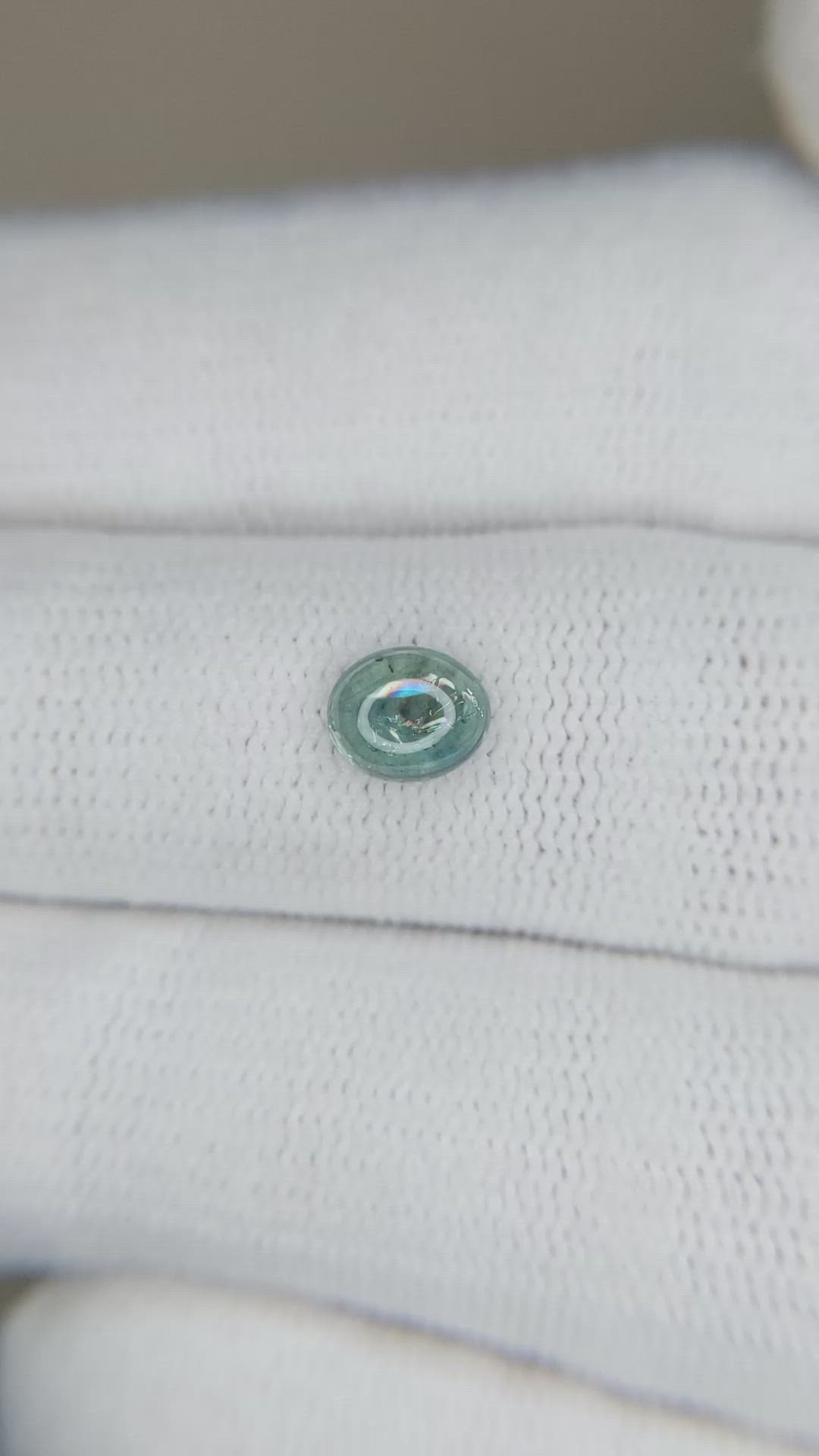 0.84 Ct. Bluish Green Cabochon Sapphire from Montana Size Video