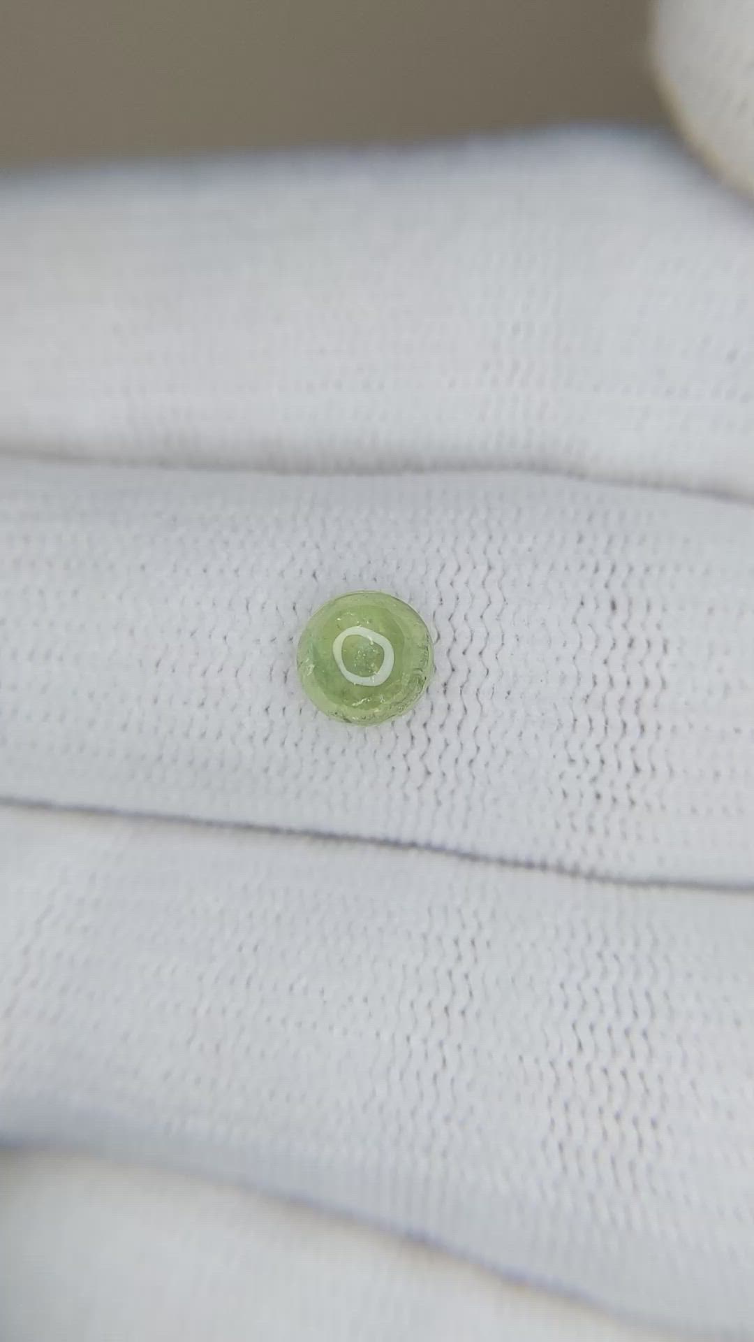 0.91 Ct. Yellowish Green Cabochon Sapphire from Montana Size Video