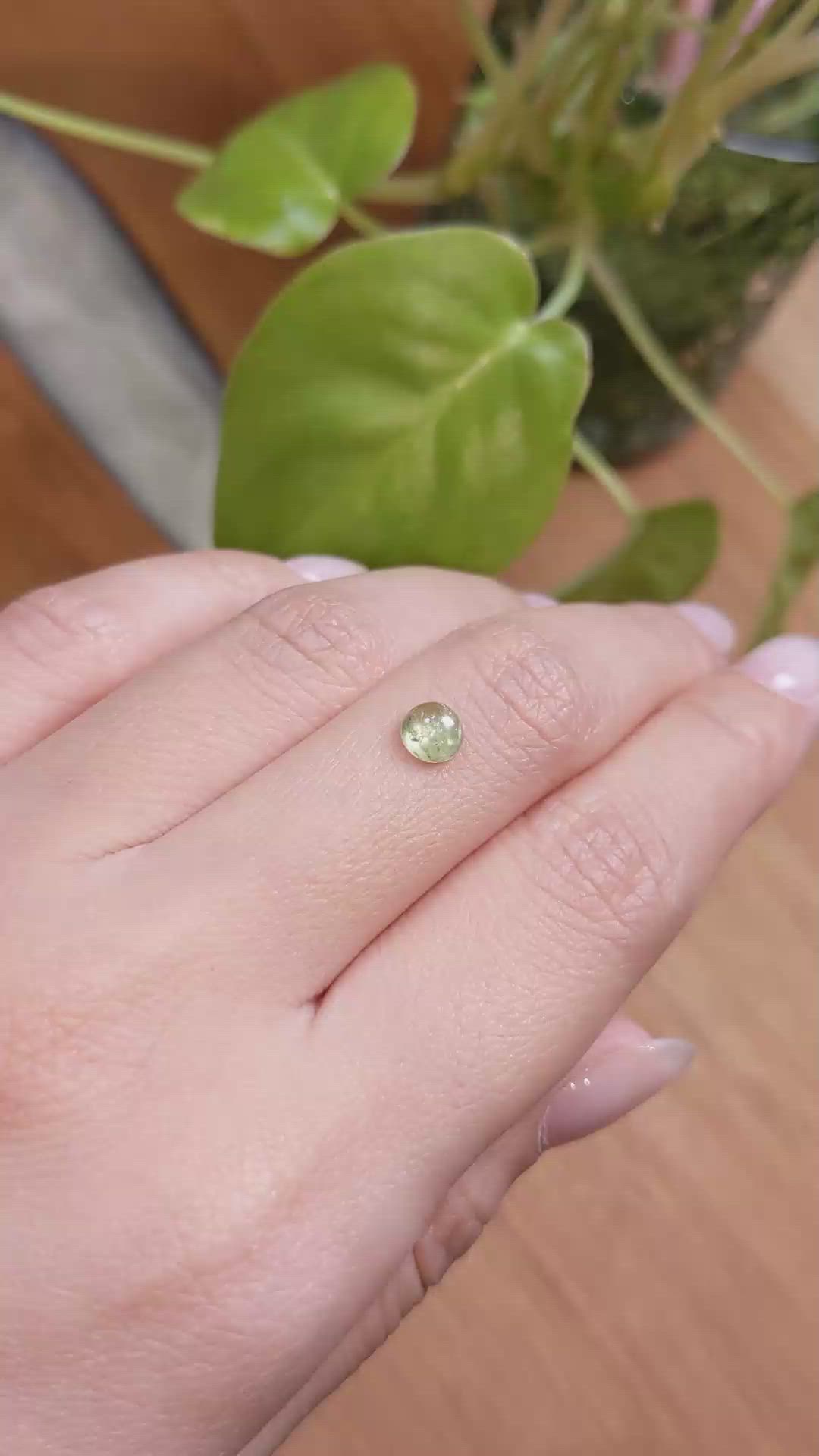 0.91 Ct. Yellowish Green Cabochon Sapphire from Montana Size Video