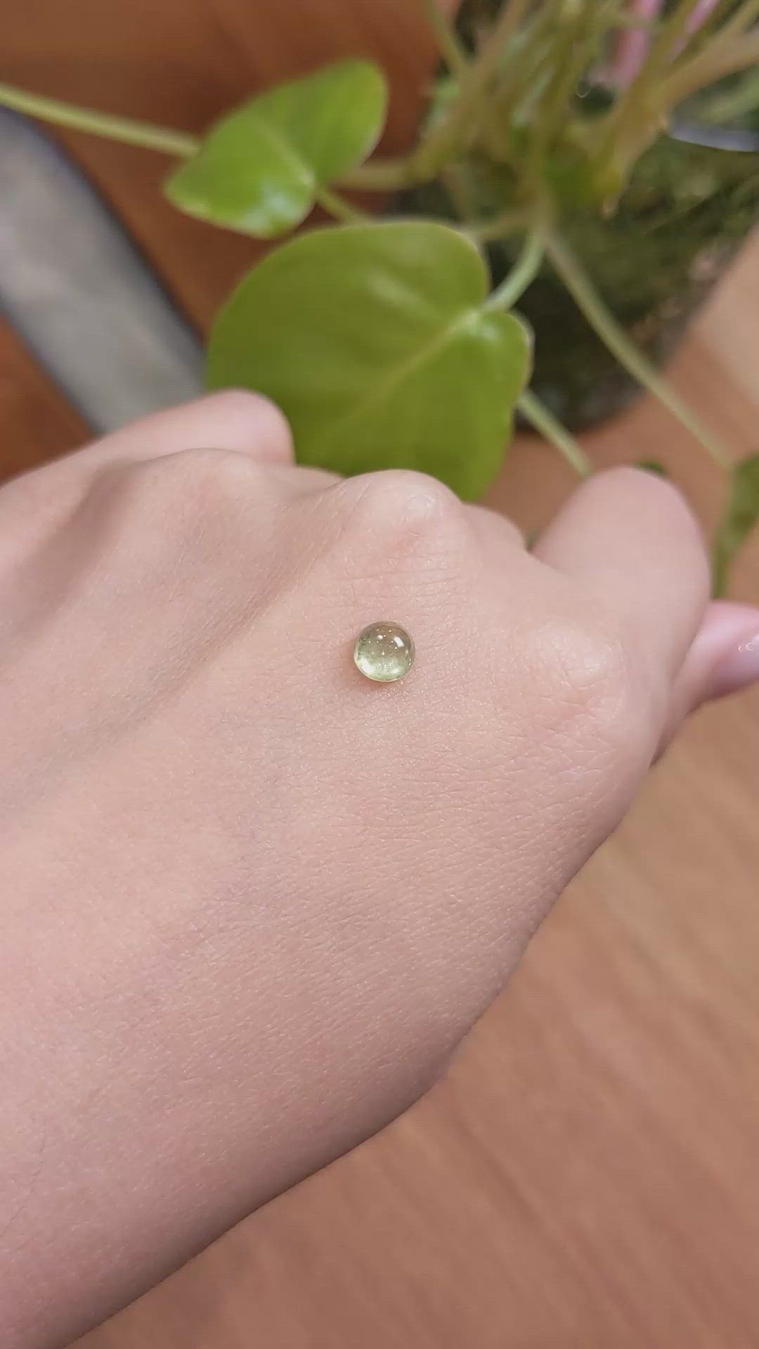 0.91 Ct. Yellowish Green Cabochon Sapphire from Montana Size Video
