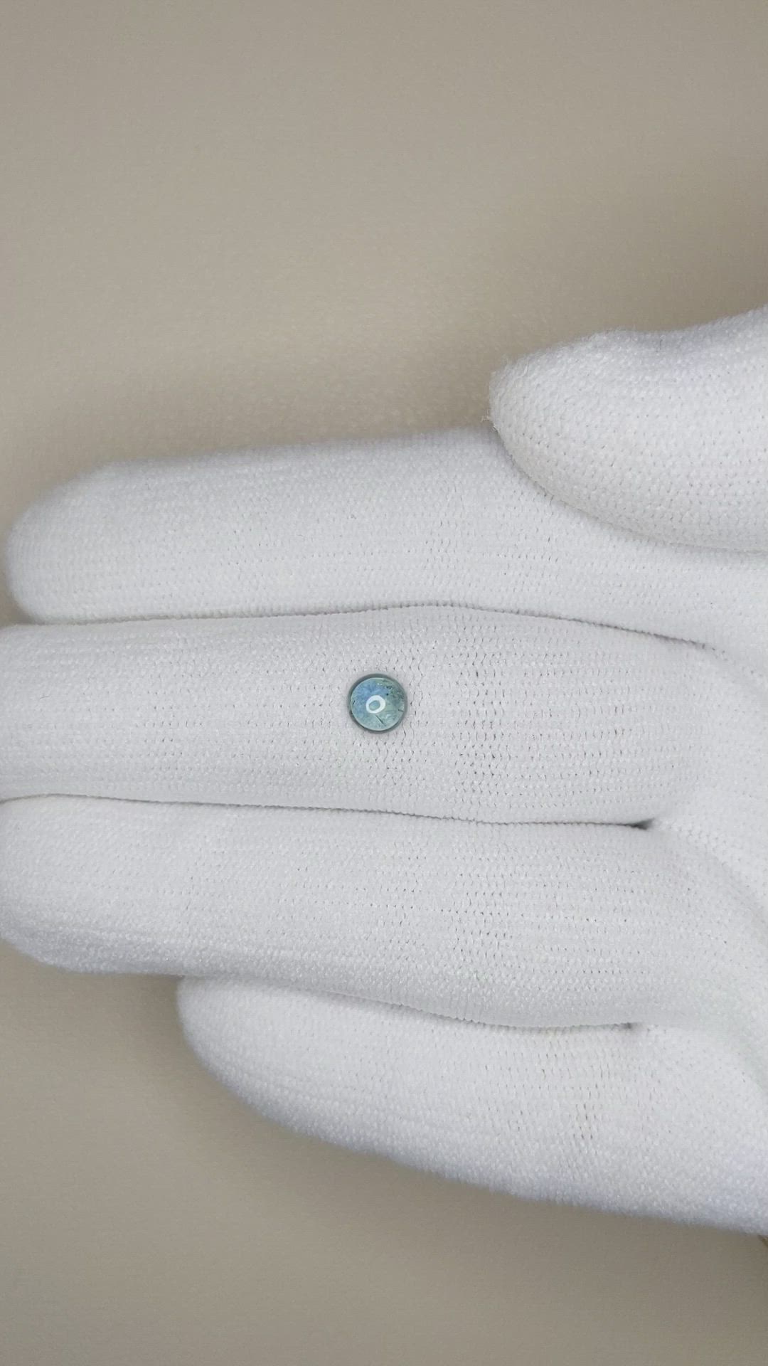 0.59 Ct. Bluish Green Cabochon Sapphire from Montana Size Video