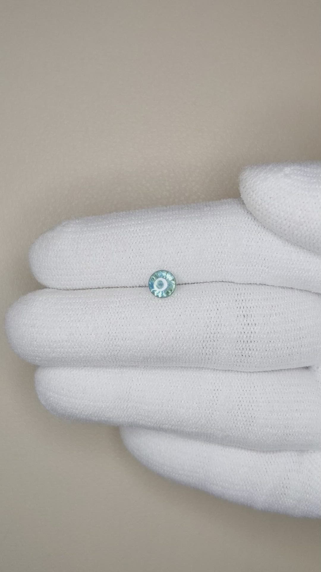 0.61 Ct. Bluish Green Cabochon Sapphire from Montana Size Video