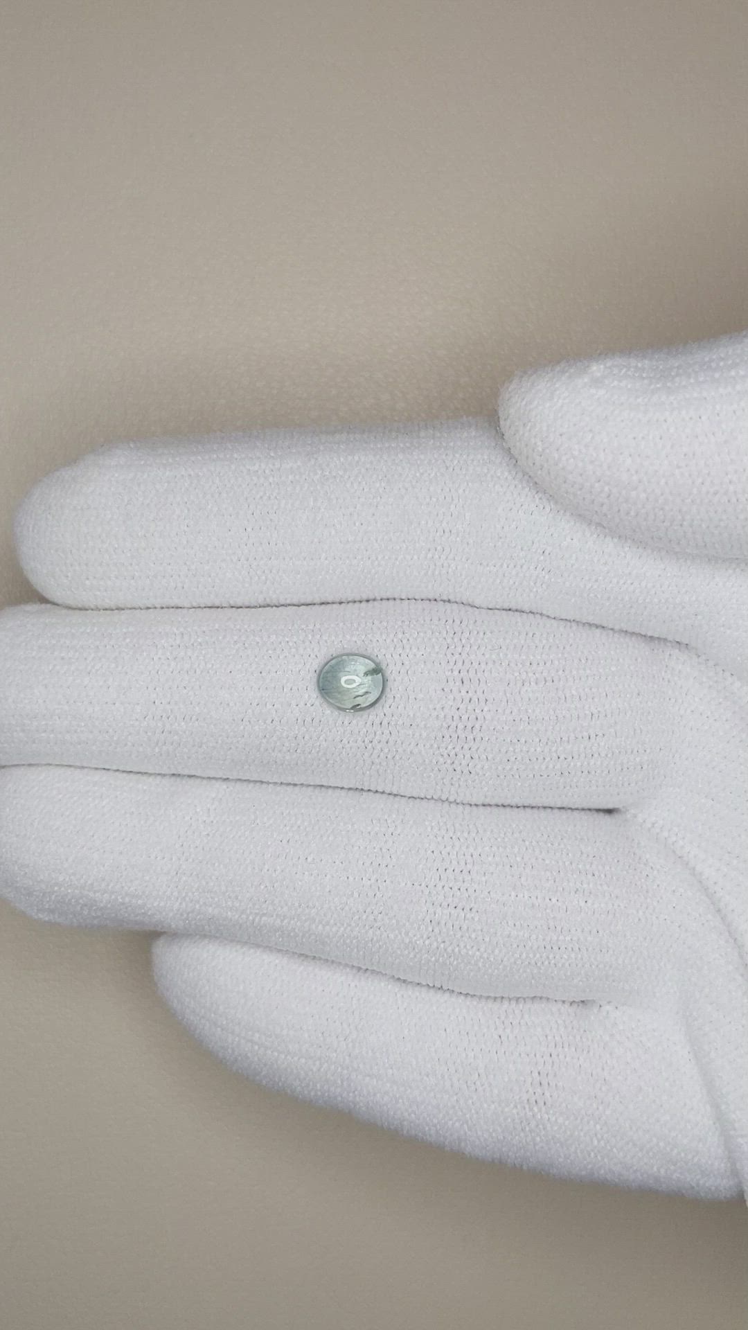 0.71 Ct. Bluish Green Cabochon Sapphire from Montana Size Video
