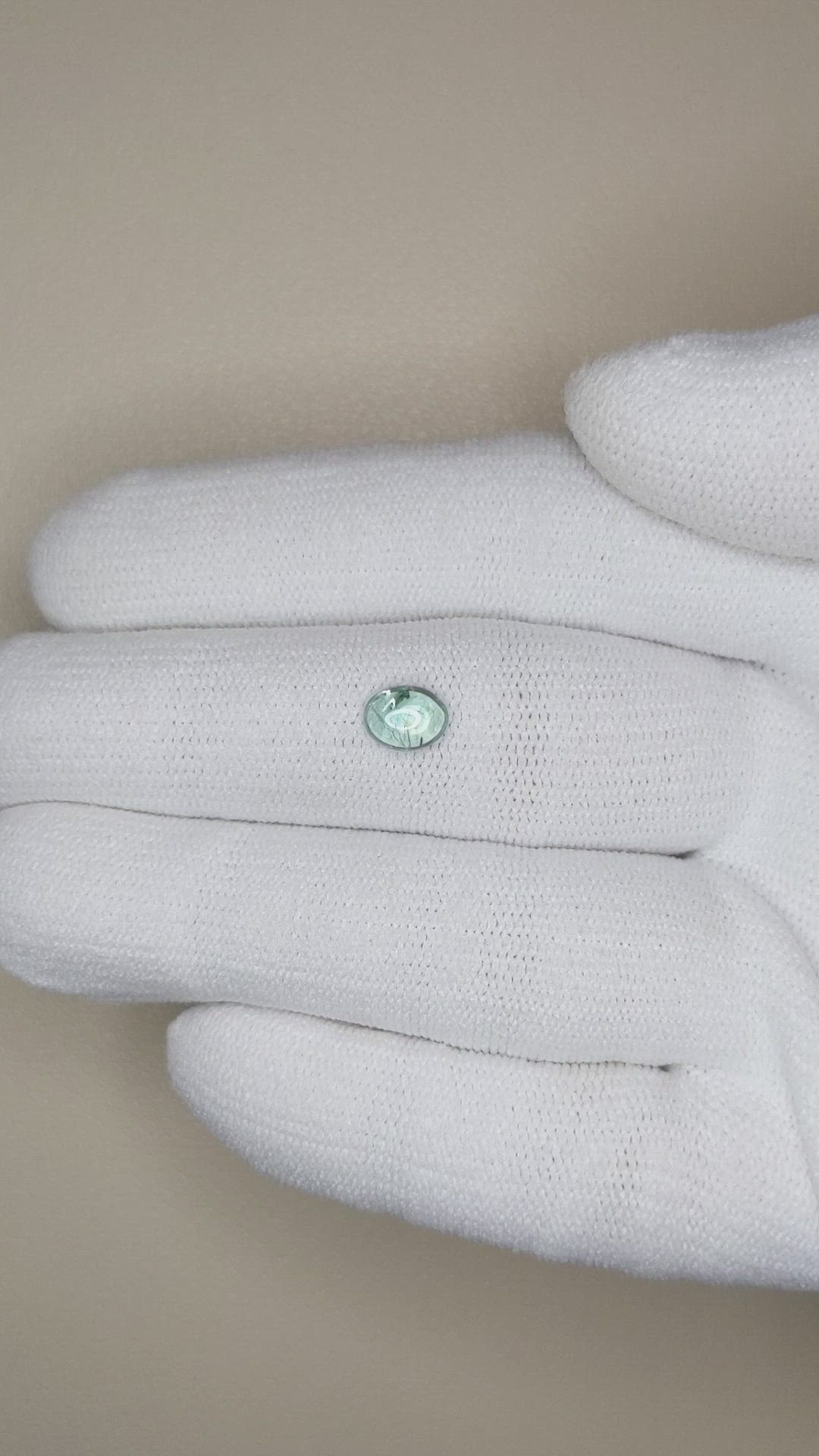 0.71 Ct. Bluish Green Cabochon Sapphire from Montana Size Video