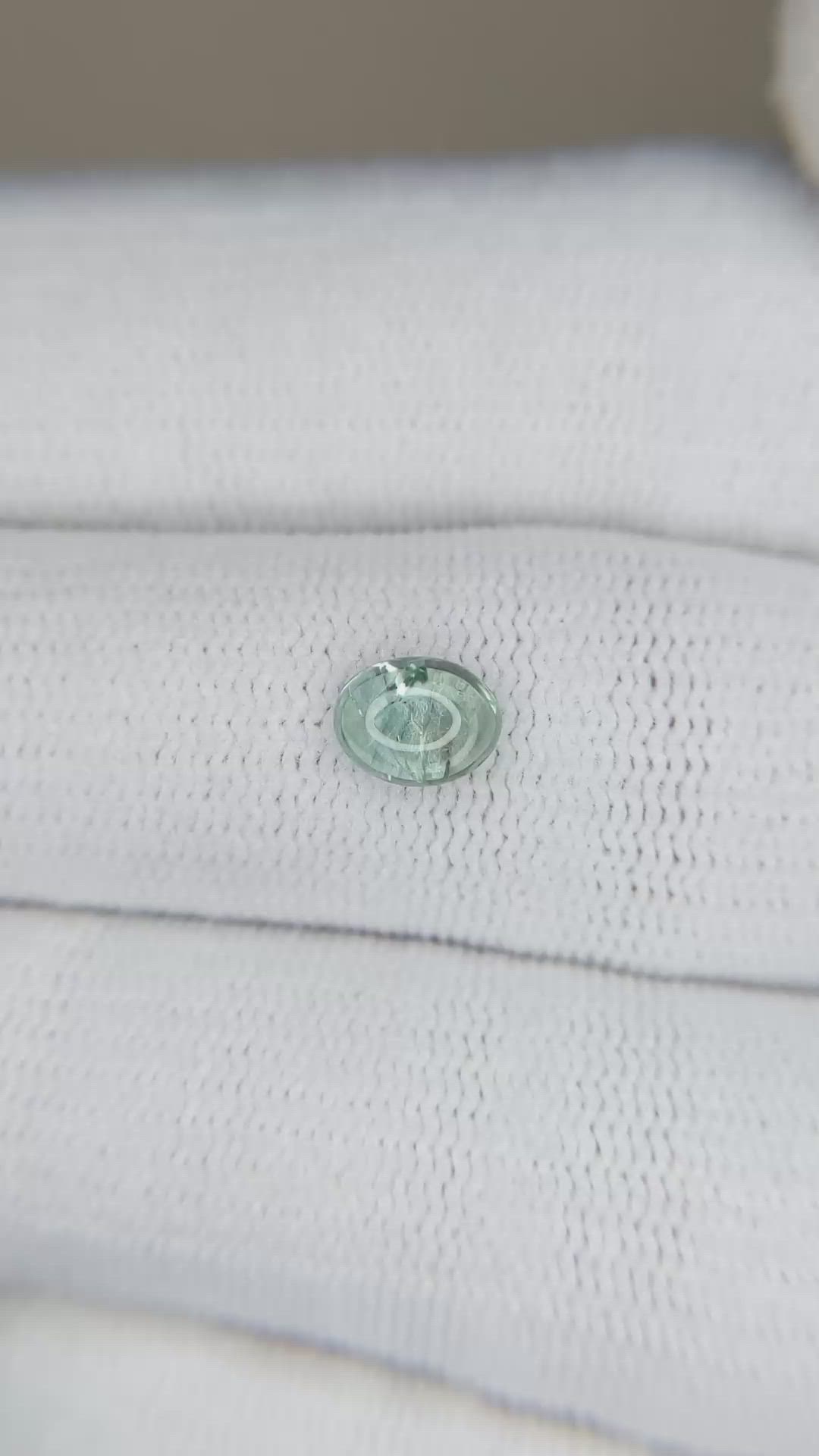 0.71 Ct. Bluish Green Cabochon Sapphire from Montana Size Video