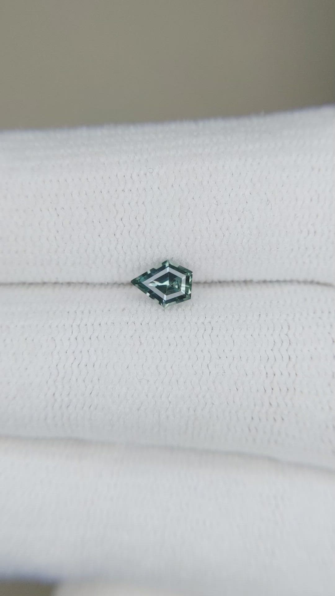 0.38 Ct. Bluish Green Sapphire from Montana Size Video