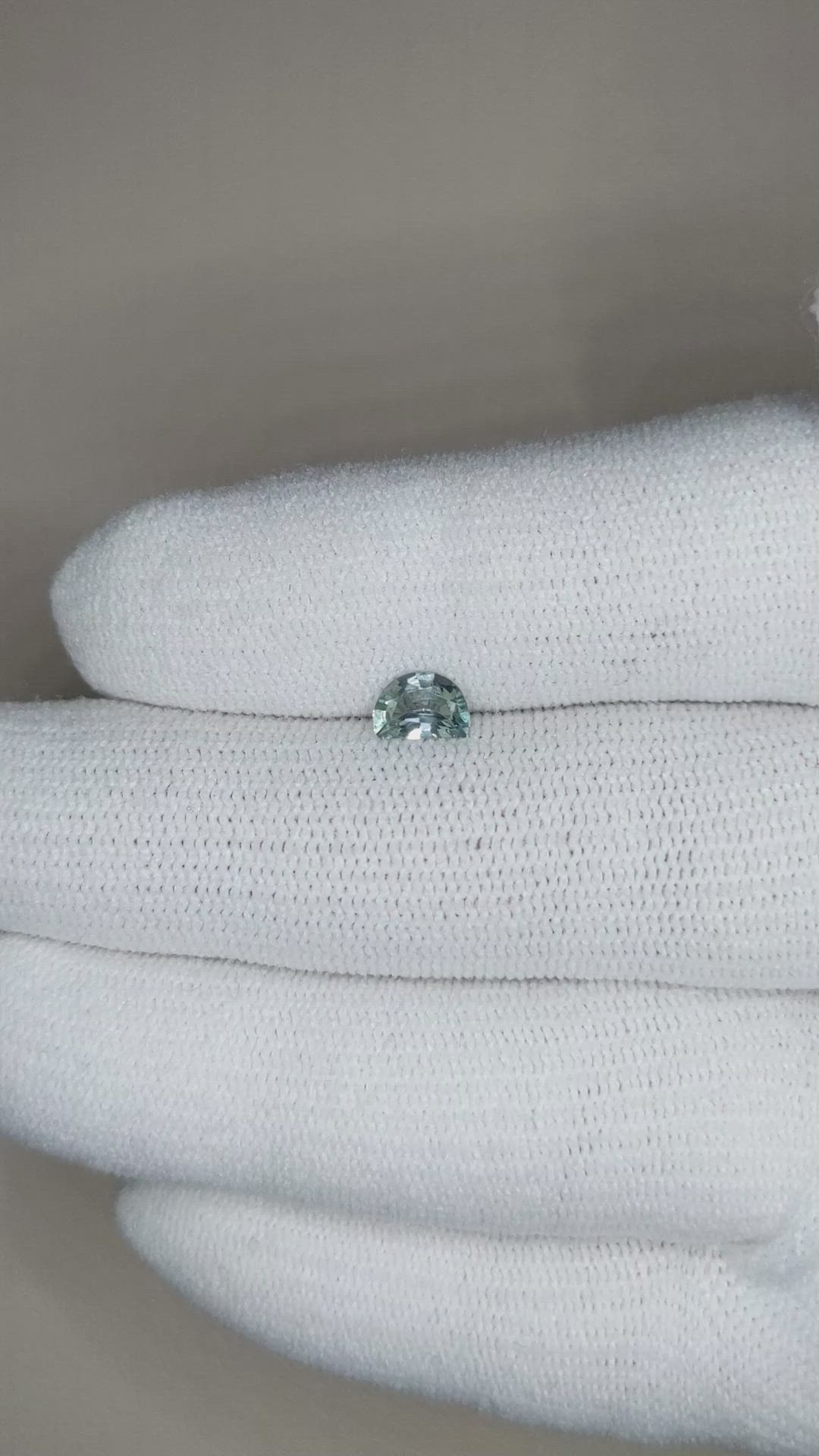 0.49 Ct. Bluish Green Sapphire from Montana Size Video
