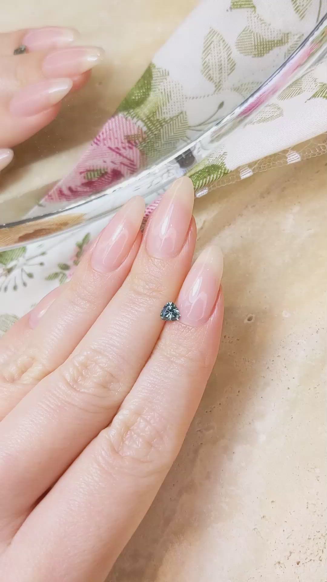 0.48 Ct. Bluish Green Sapphire from Montana Size Video