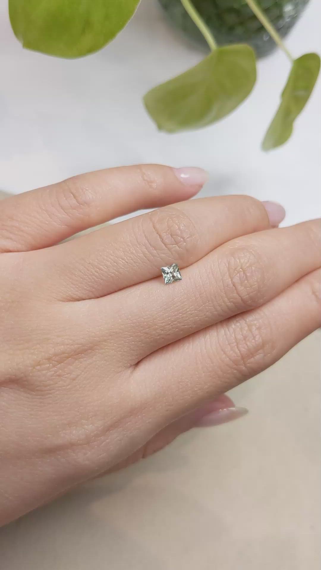 0.41 Ct. Yellowish Green Sapphire from Montana Size Video