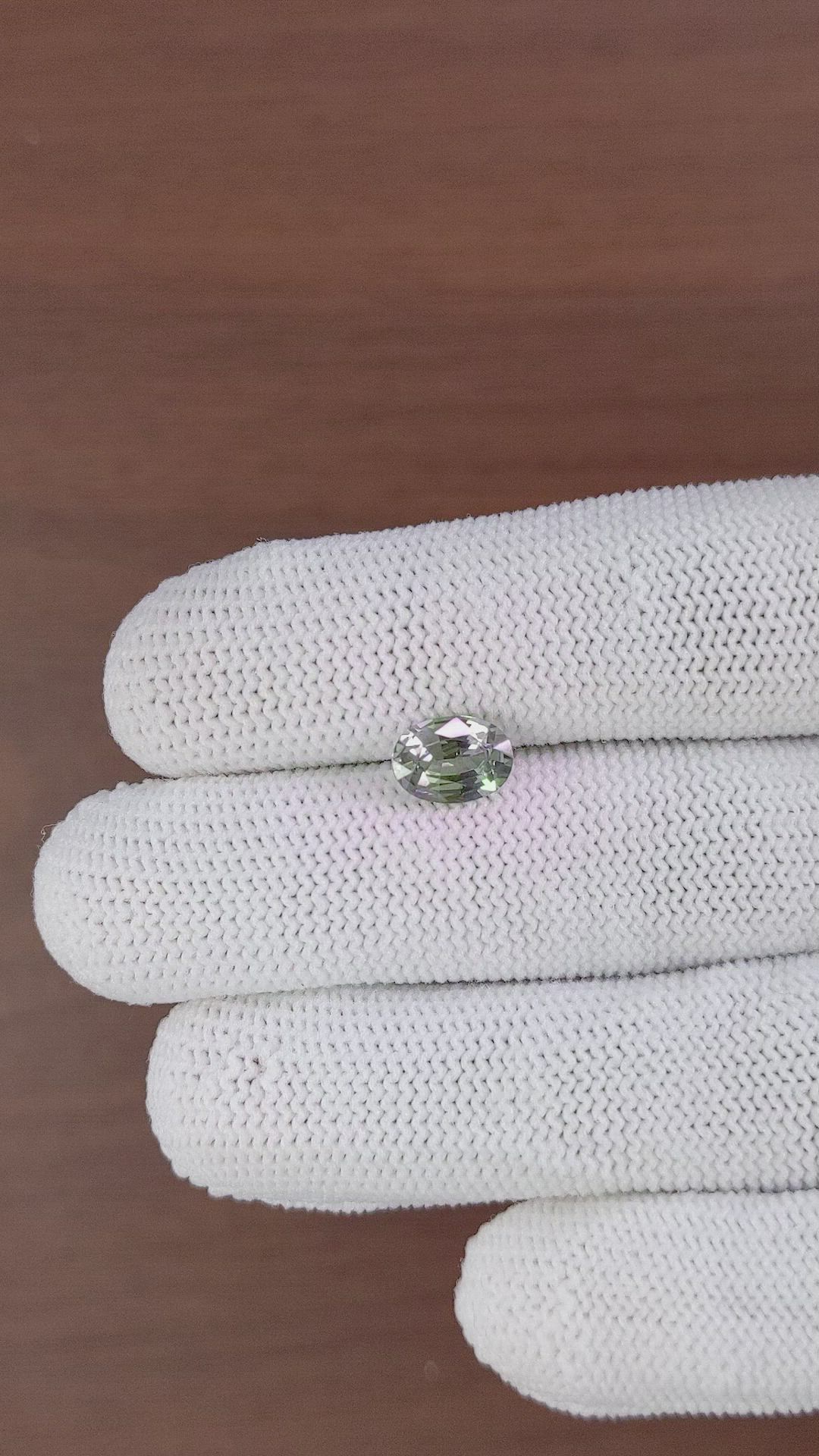 1.77 Ct. Greenish Brown Sapphire from Madagascar Size Video