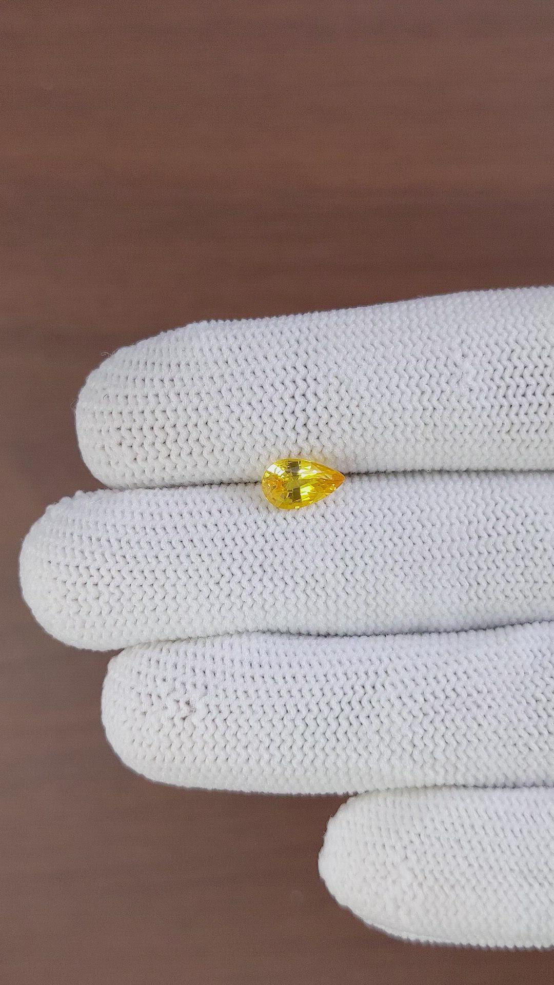 1.08 Ct. Orangish Yellow Sapphire from Ceylon (Sri Lanka) Size Video