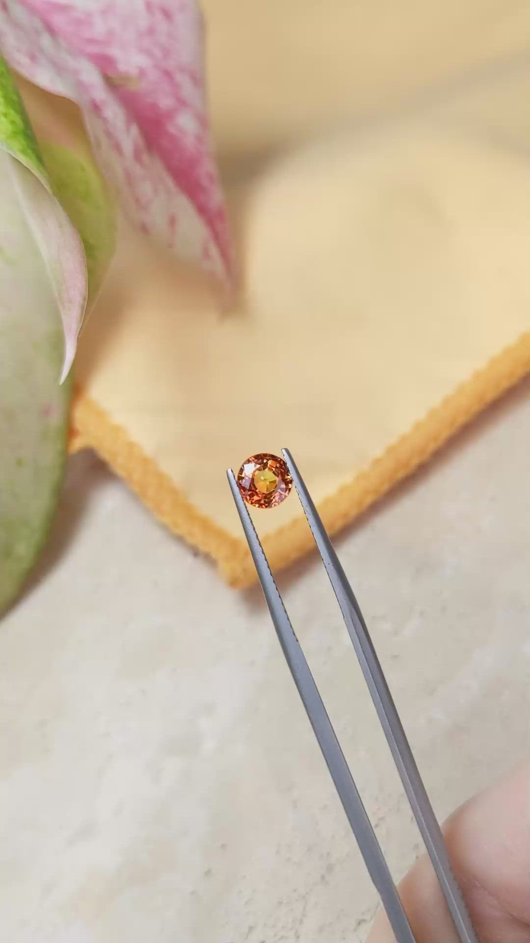 1.50 Ct. Reddish Orange Sapphire from Ceylon (Sri Lanka) Size Video