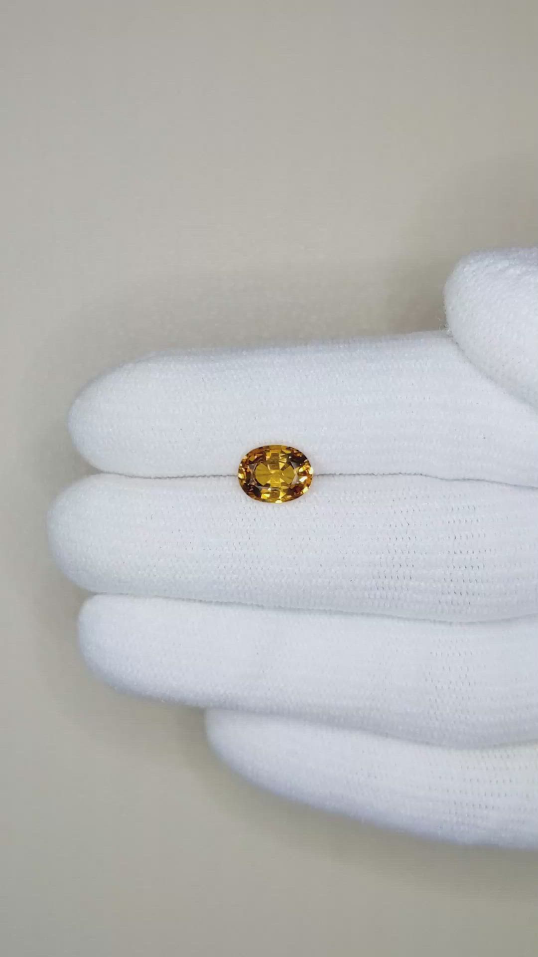 1.68 Ct. Orangish Yellow Sapphire from Ceylon (Sri Lanka) Size Video