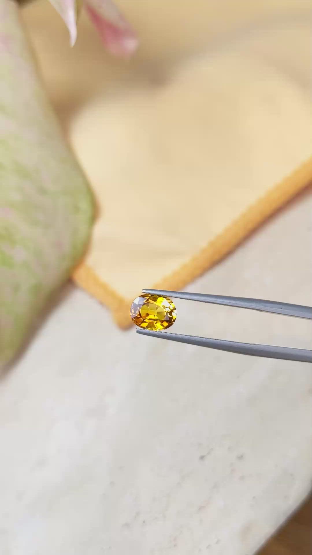 1.68 Ct. Orangish Yellow Sapphire from Ceylon (Sri Lanka) Size Video