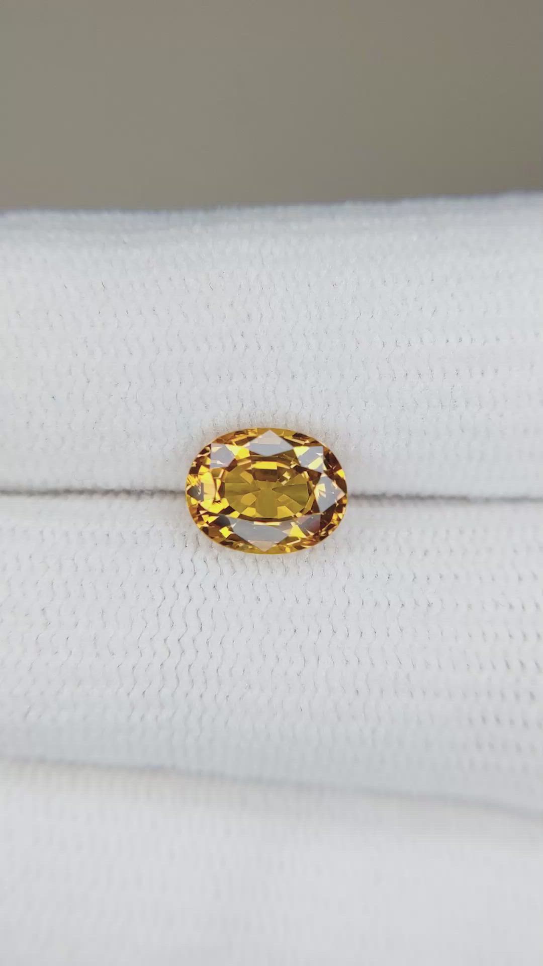 1.68 Ct. Orangish Yellow Sapphire from Ceylon (Sri Lanka) Size Video