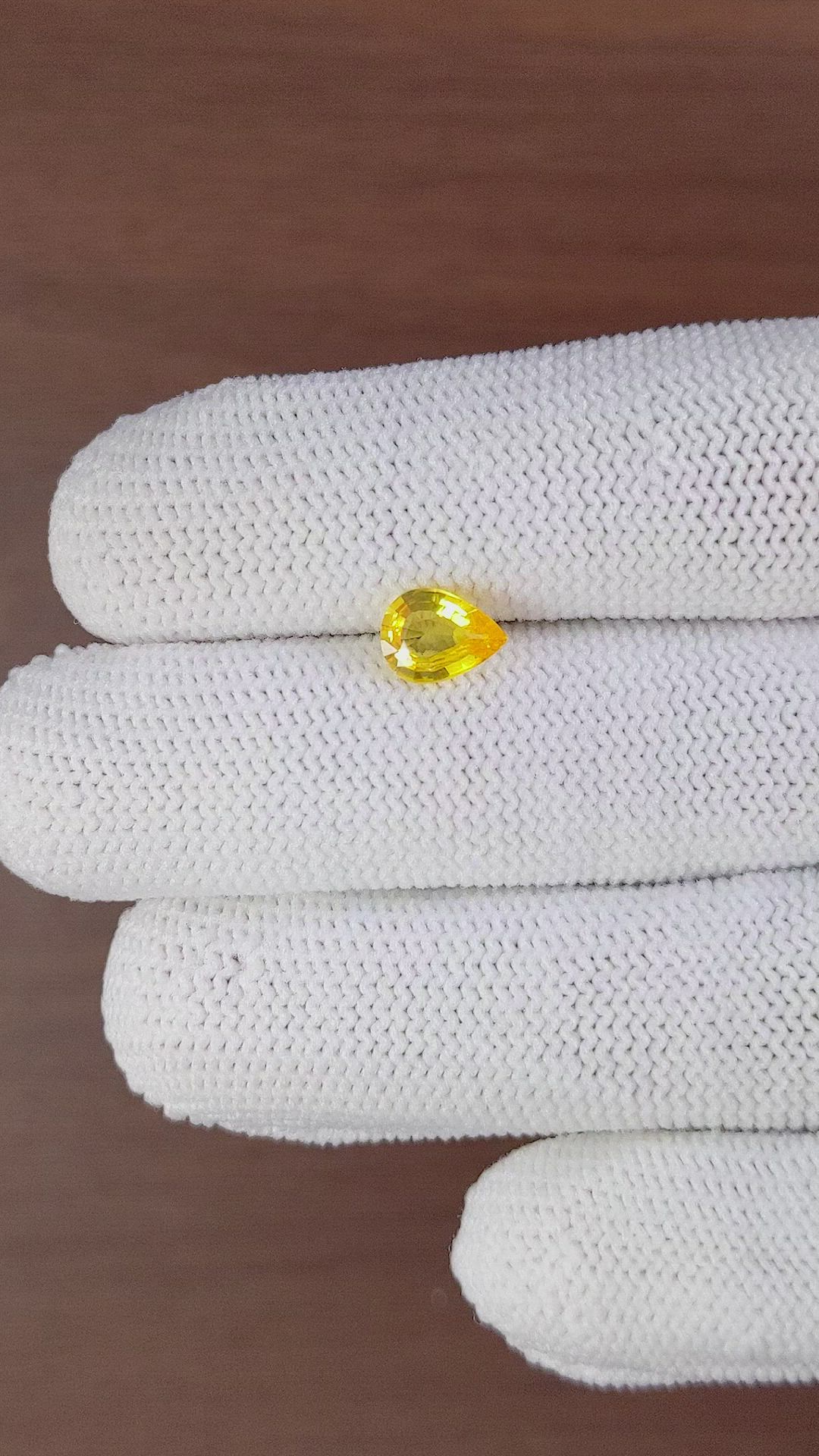 0.98 Ct. Orangish Yellow Sapphire from Ceylon (Sri Lanka) Size Video