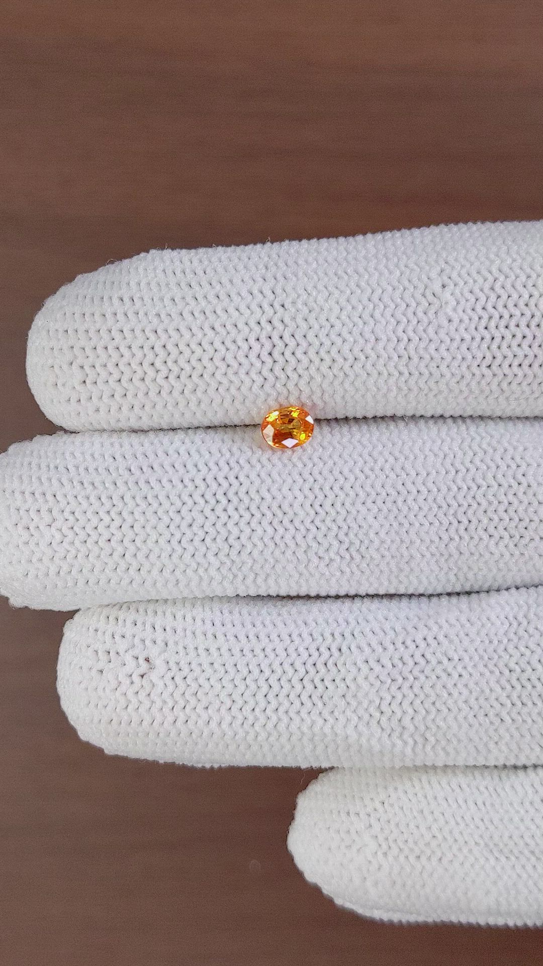 0.48 Ct. Yellowish Orange Sapphire from Ceylon (Sri Lanka) Size Video