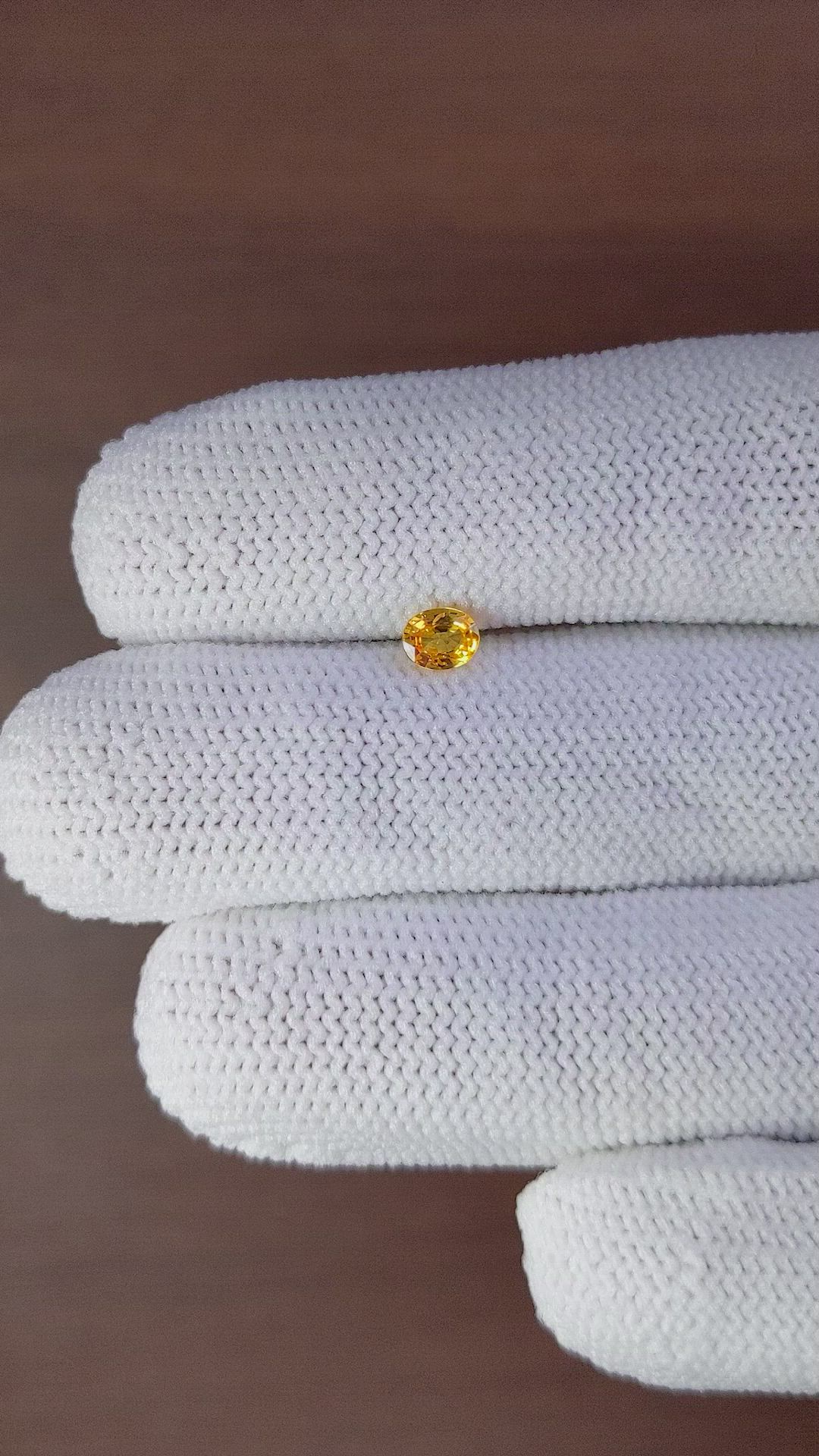 0.36 Ct. Yellowish Orange Sapphire from Ceylon (Sri Lanka) Size Video
