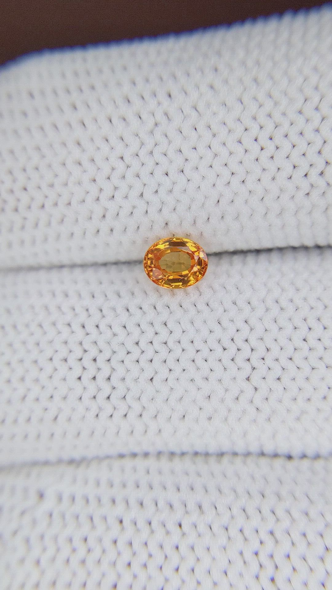 0.52 Ct. Orange Sapphire from Ceylon (Sri Lanka) Size Video