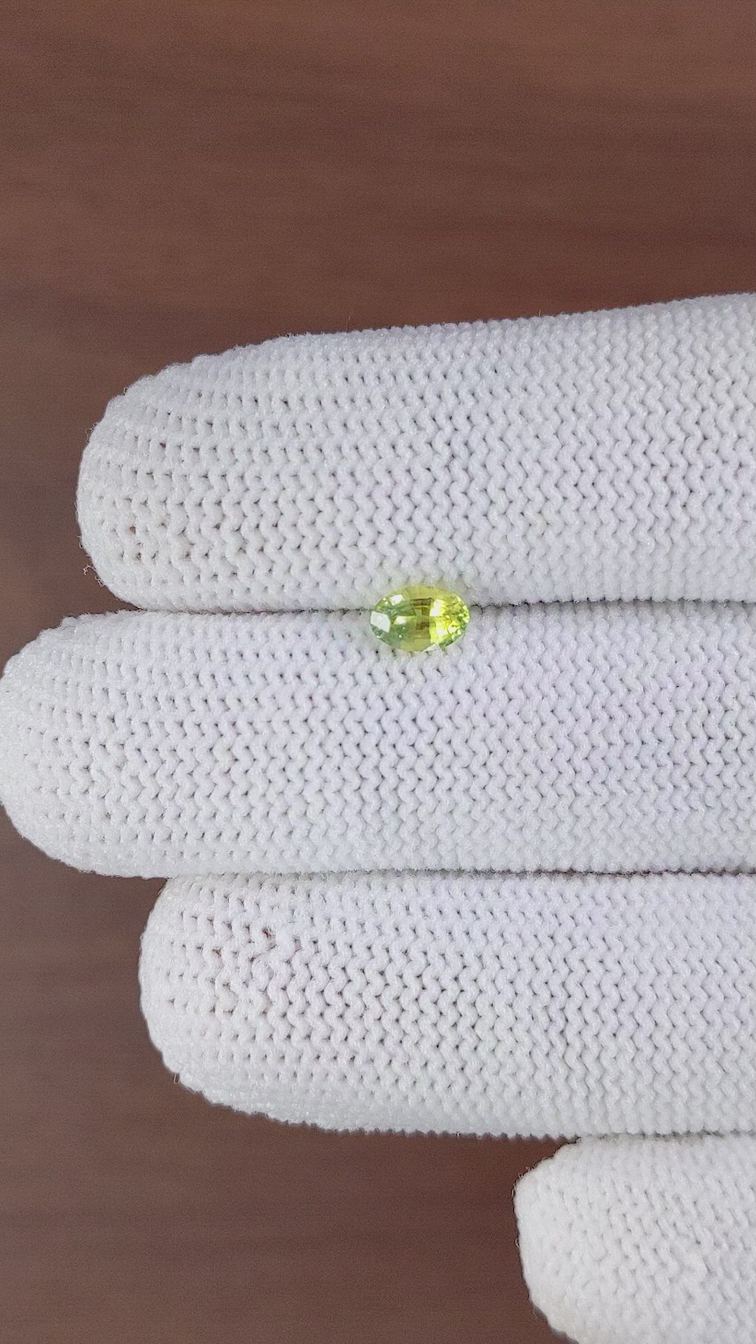 0.58 Ct. Yellowish Green Sapphire from Ceylon (Sri Lanka) Size Video