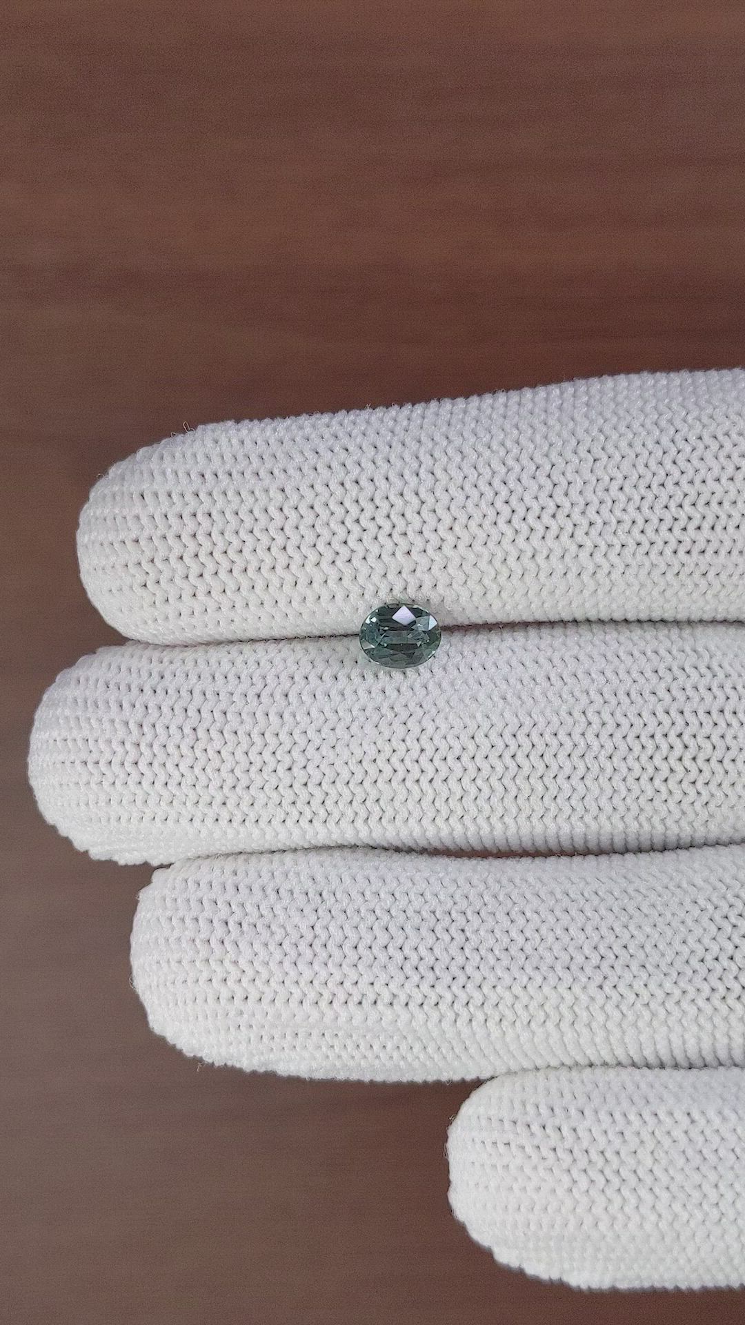 0.93 Ct. Bluish Green Sapphire from Madagascar Size Video