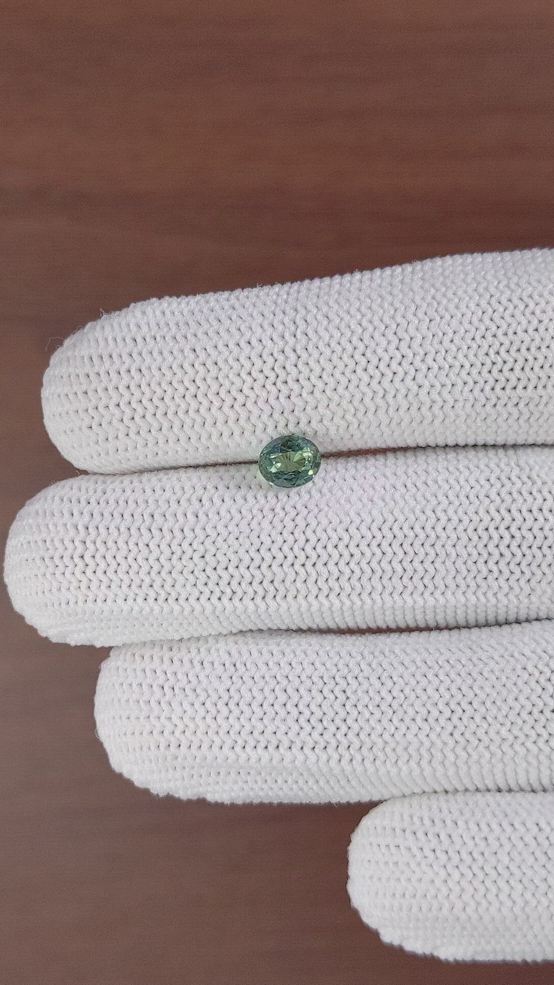 0.99 Ct. Bluish Green Sapphire from Madagascar Size Video