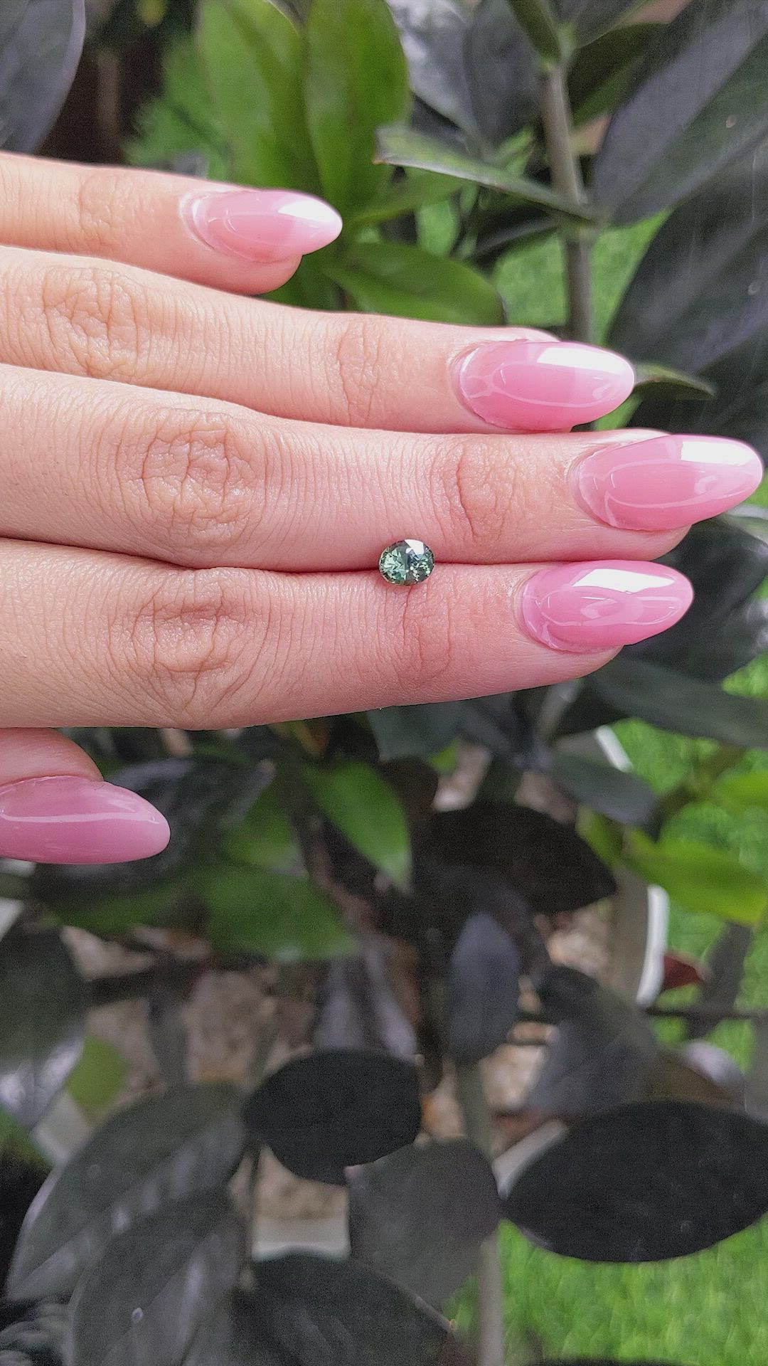 0.91 Ct. Bluish Green Sapphire from Madagascar Size Video