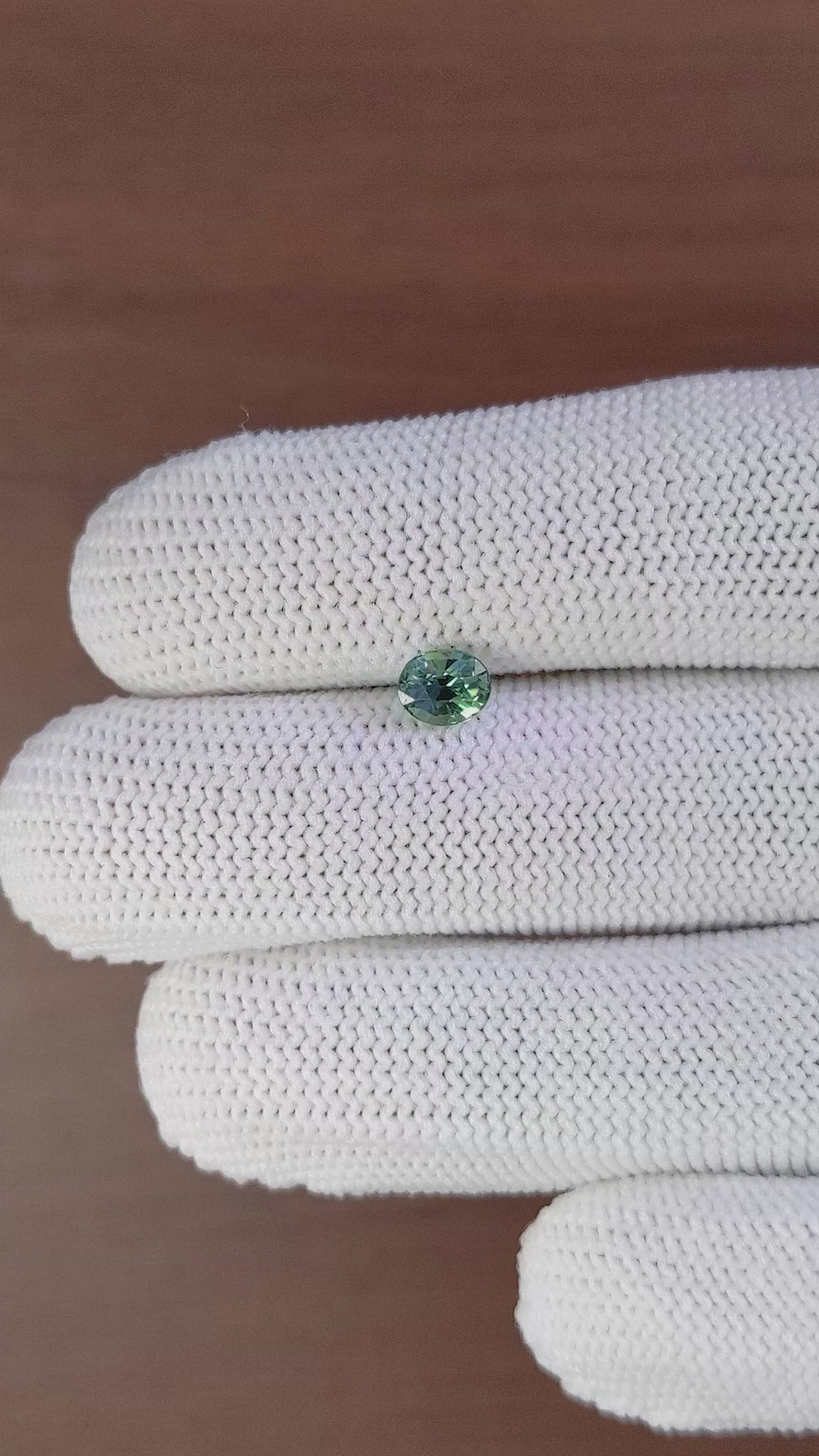 0.91 Ct. Bluish Green Sapphire from Madagascar Size Video