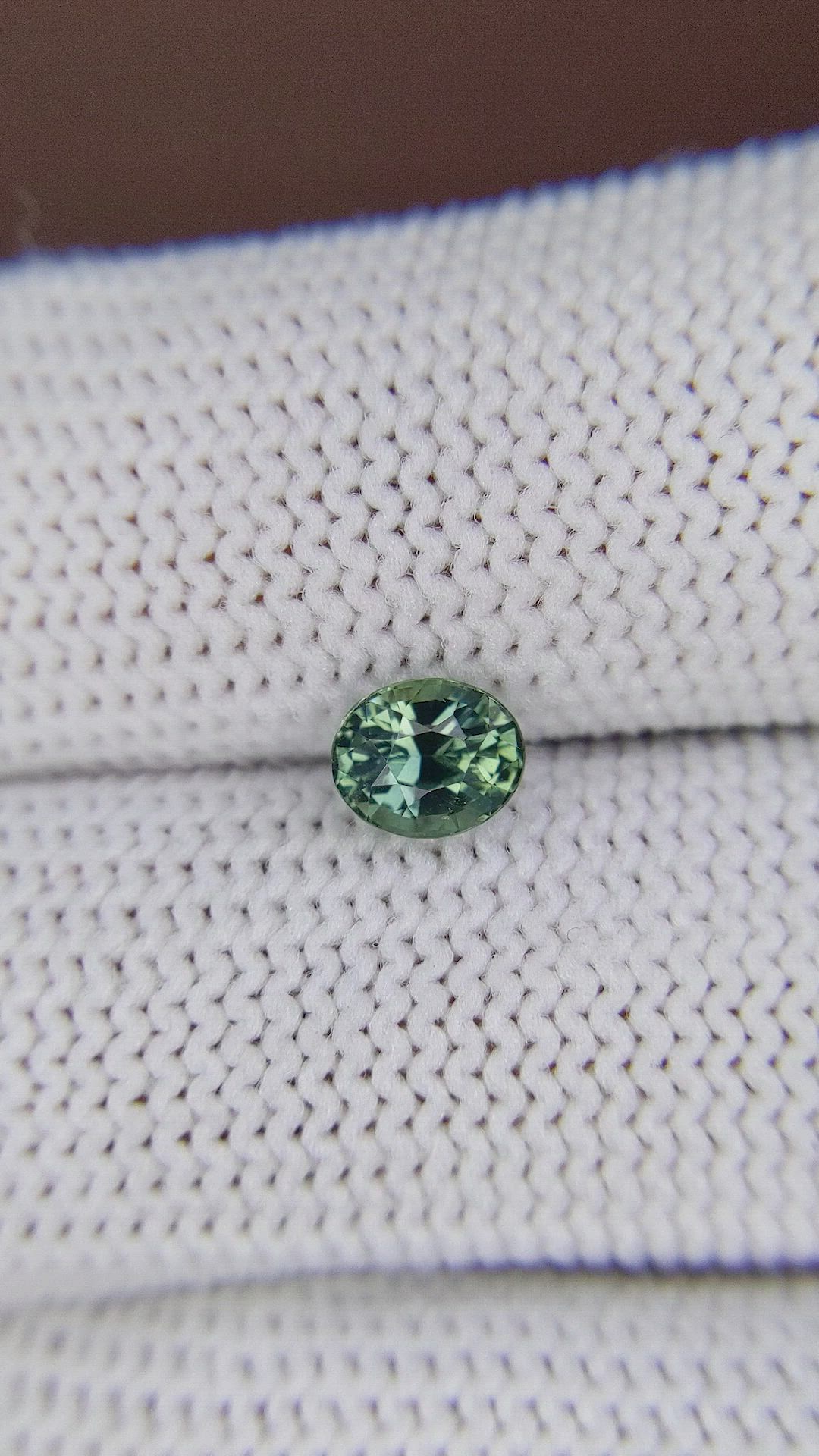 0.91 Ct. Bluish Green Sapphire from Madagascar Size Video